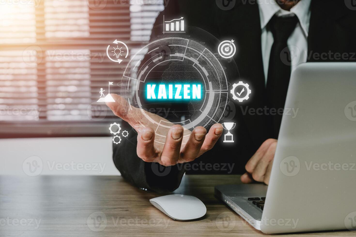 KAIZEN concept, Businessman hand holding kaizen icon on virtual screen, Business philosophy and corporate strategy concept of continual improvement. photo