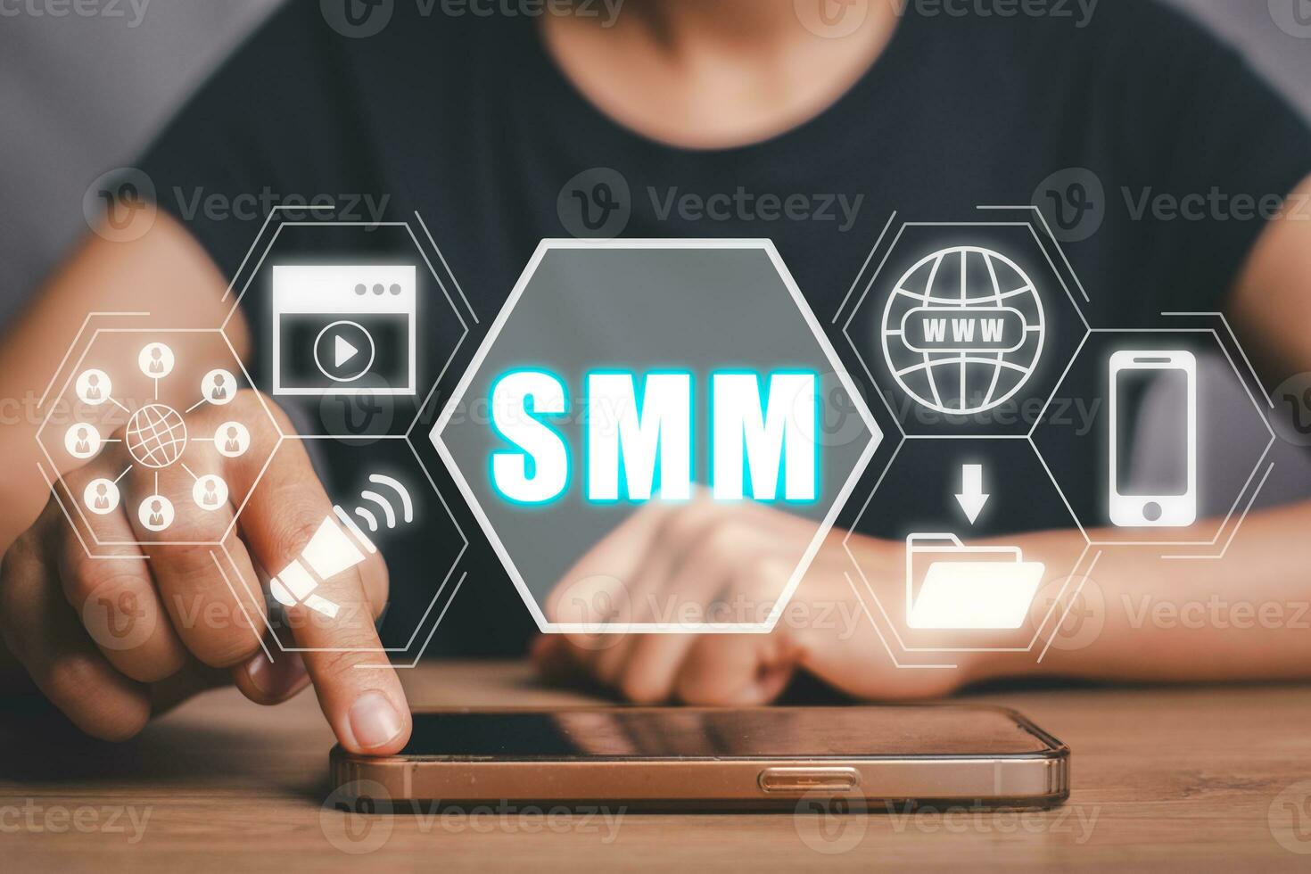 SMM, Social media marketing concept, Woman using smart phone on office desk with social media marketing icon on virtual screen. photo