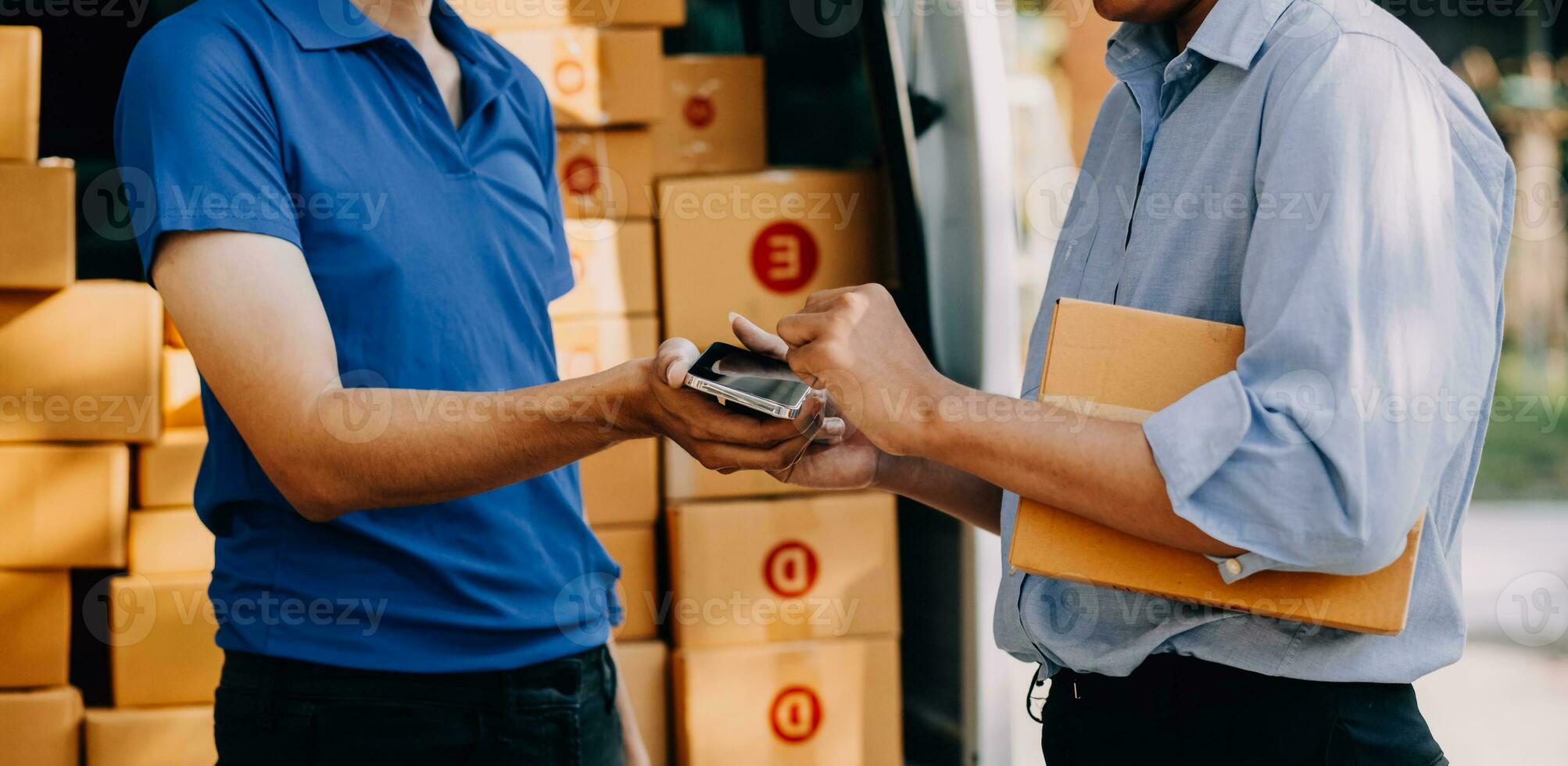 SME entrepreneur Small business entrepreneurs Online selling ideas,Happy Young Asian business owner work on computer and a boxs at home,delivery SME procurement package box deliver to customers, photo