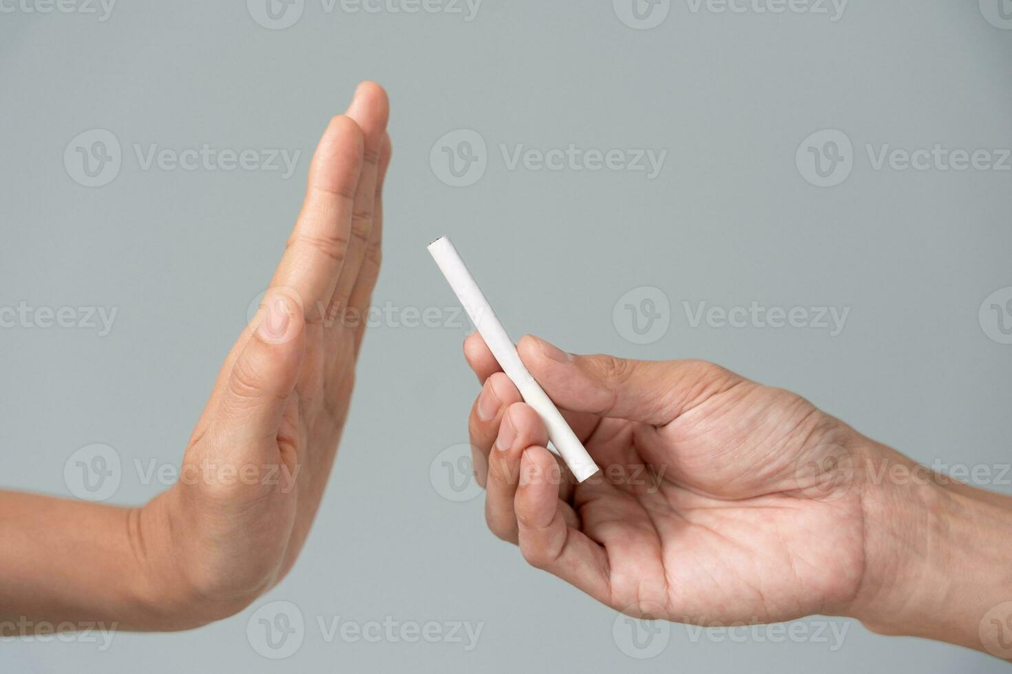 man refuses say no and avoid to drink an alcohol whiskey , stopping hand sign male, alcoholism treatment, alcohol addiction, quit booze, Stop Drinking Alcohol. Refuse Glass liquor, unhealthy, reject photo