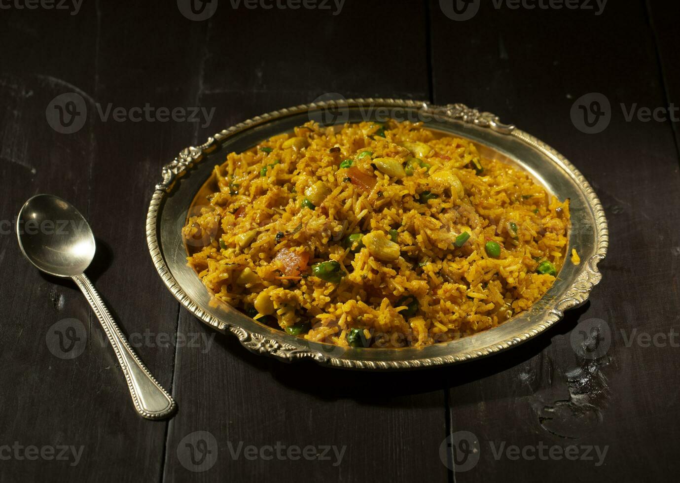 Indian Cuisine Food Kashmiri Pulao is A Delicious Rice Preparation Where Rice is Cooked in Milk and is Loaded With Dry Fruits And Vegetables photo