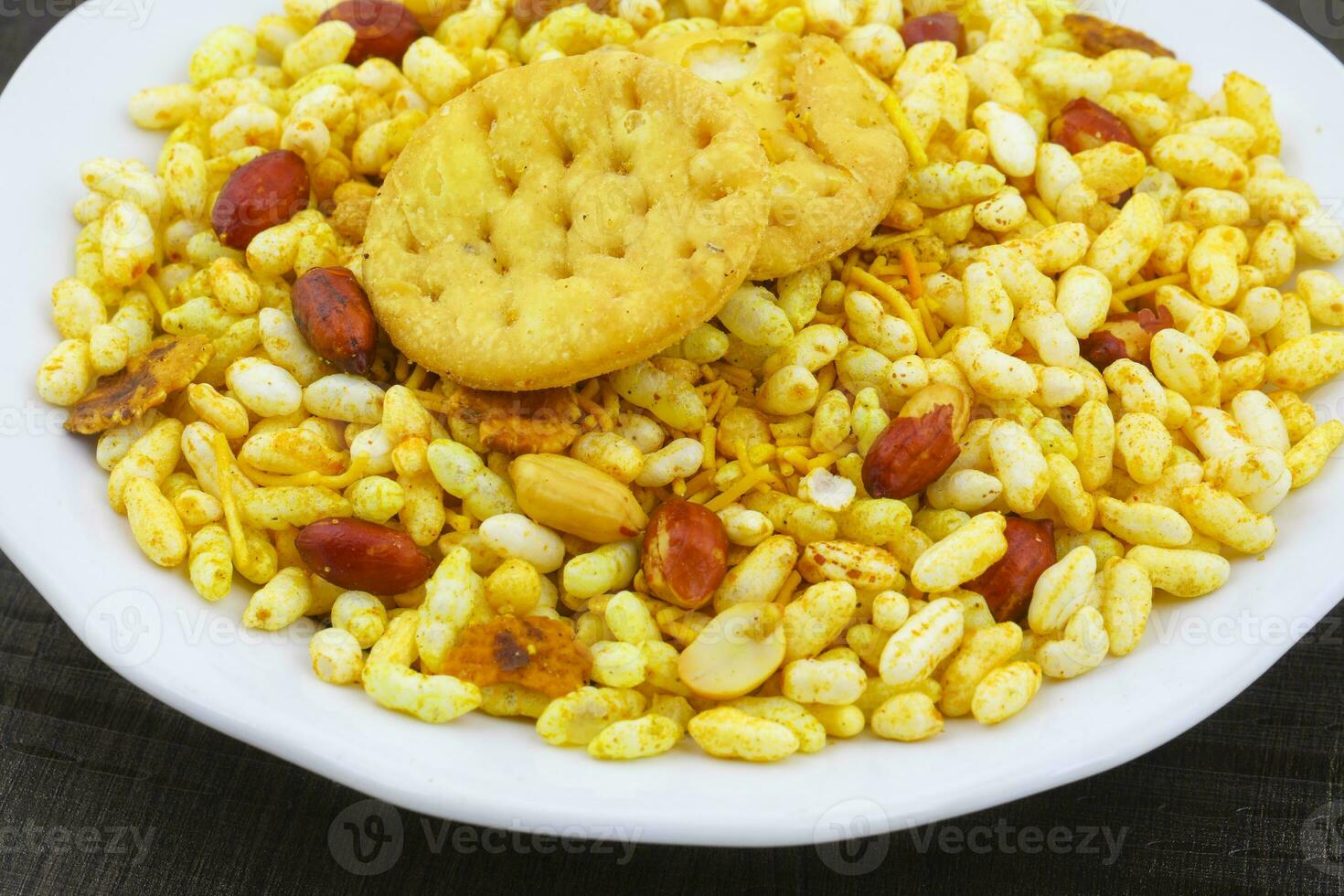 Indian Street Spicy Food Bhel puri is a savoury snack photo
