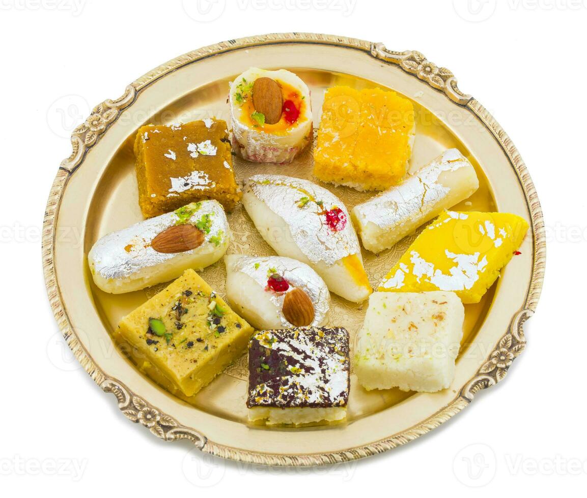 Indian Delicious Mix Sweet Food or Mix Mithai on White Background photo