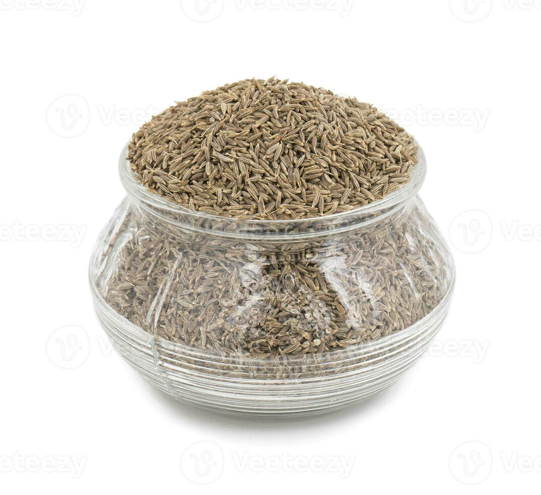 Pile of Dried Cumin Seeds on white Background photo