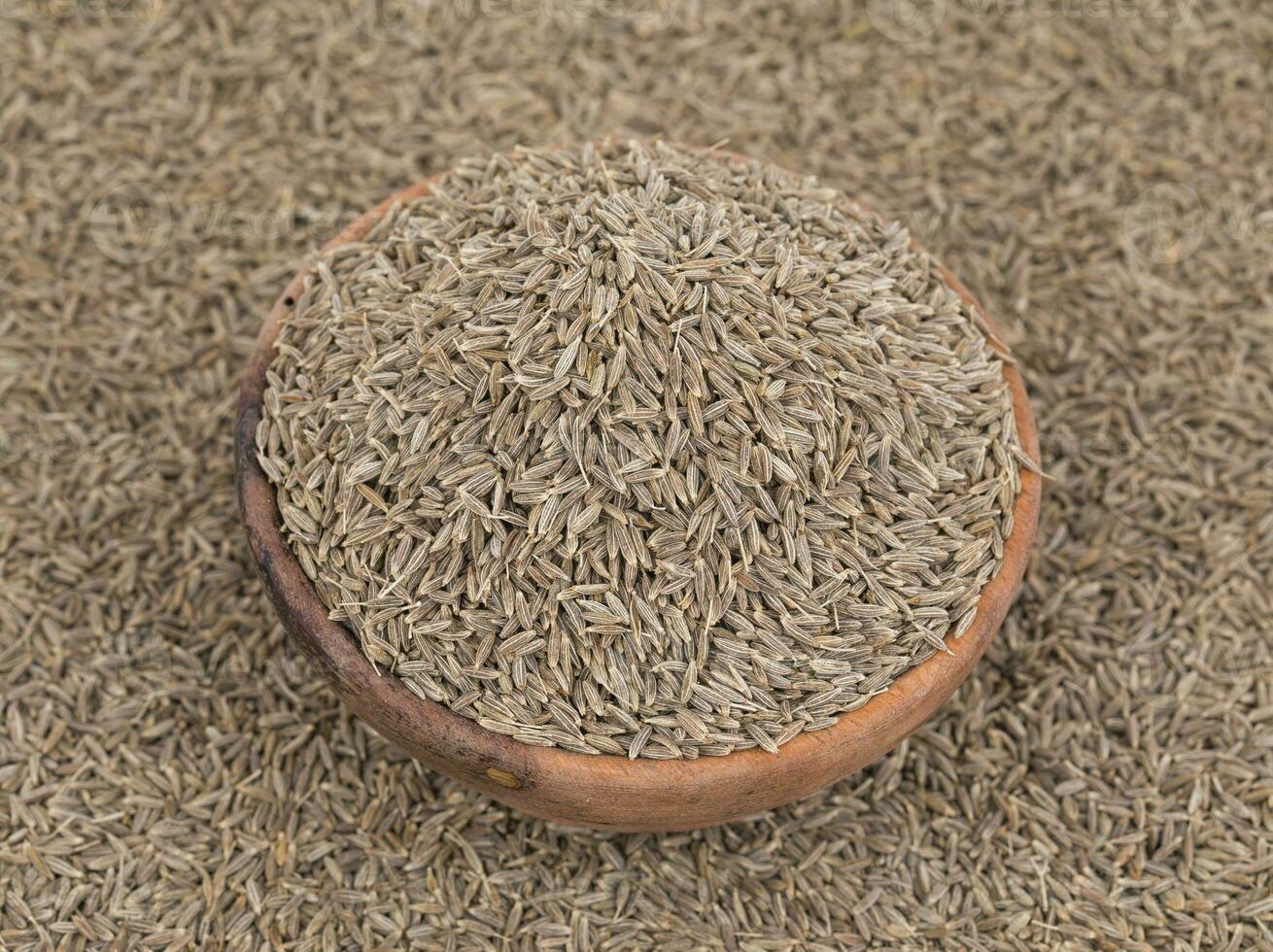 Pile of Dried Cumin Seeds photo