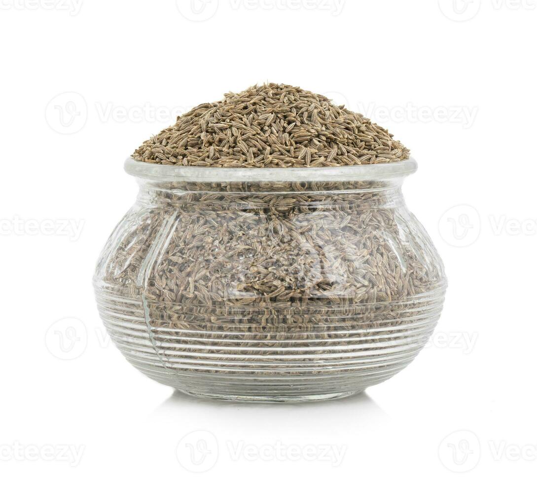 Pile of Dried Cumin Seeds on white Background photo