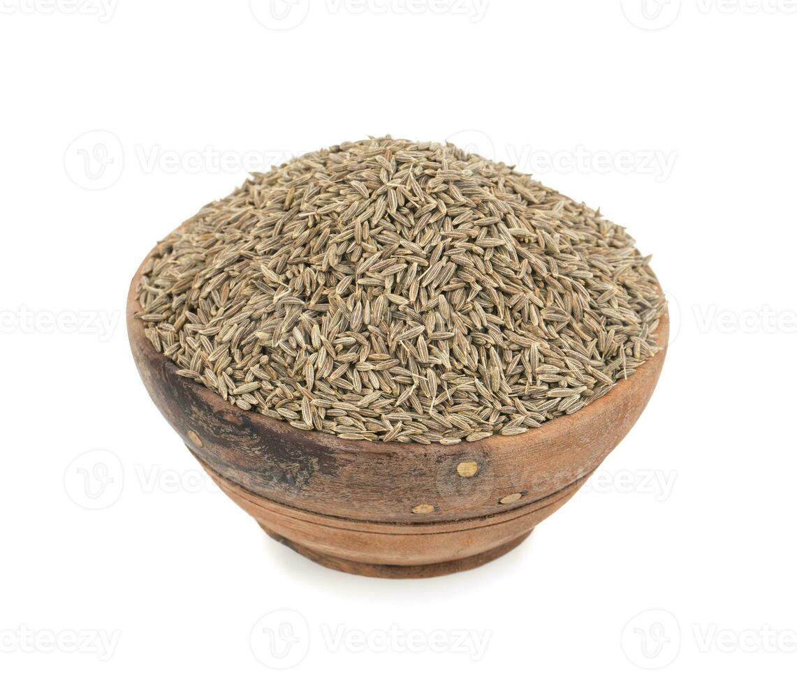 Pile of Dried Cumin Seeds on white Background photo
