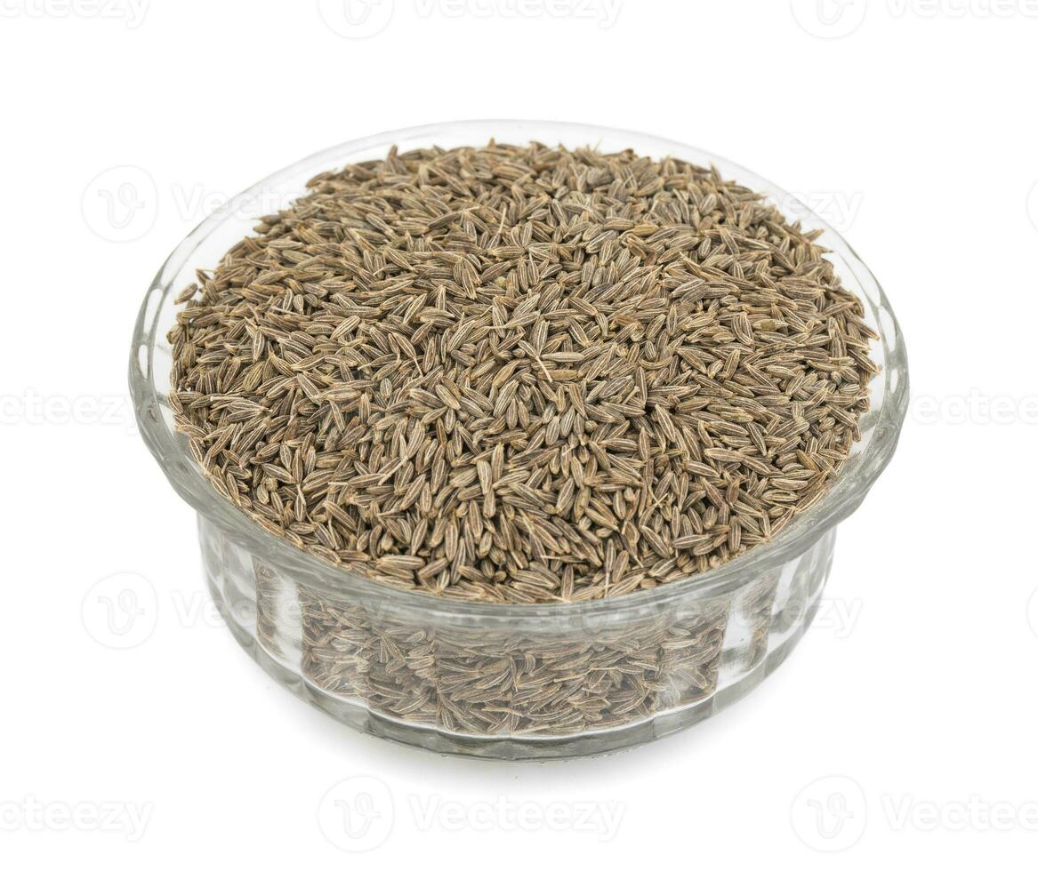 Pile of Dried Cumin Seeds on white Background photo