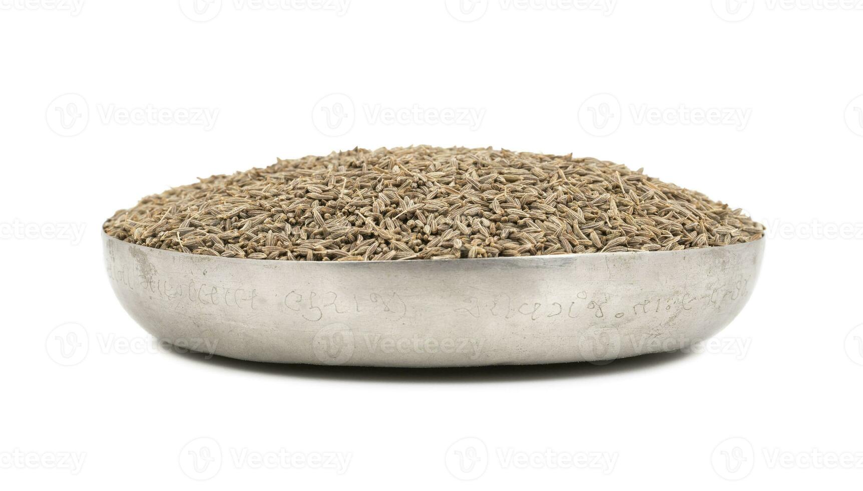 Pile of Dried Cumin Seeds on white Background photo