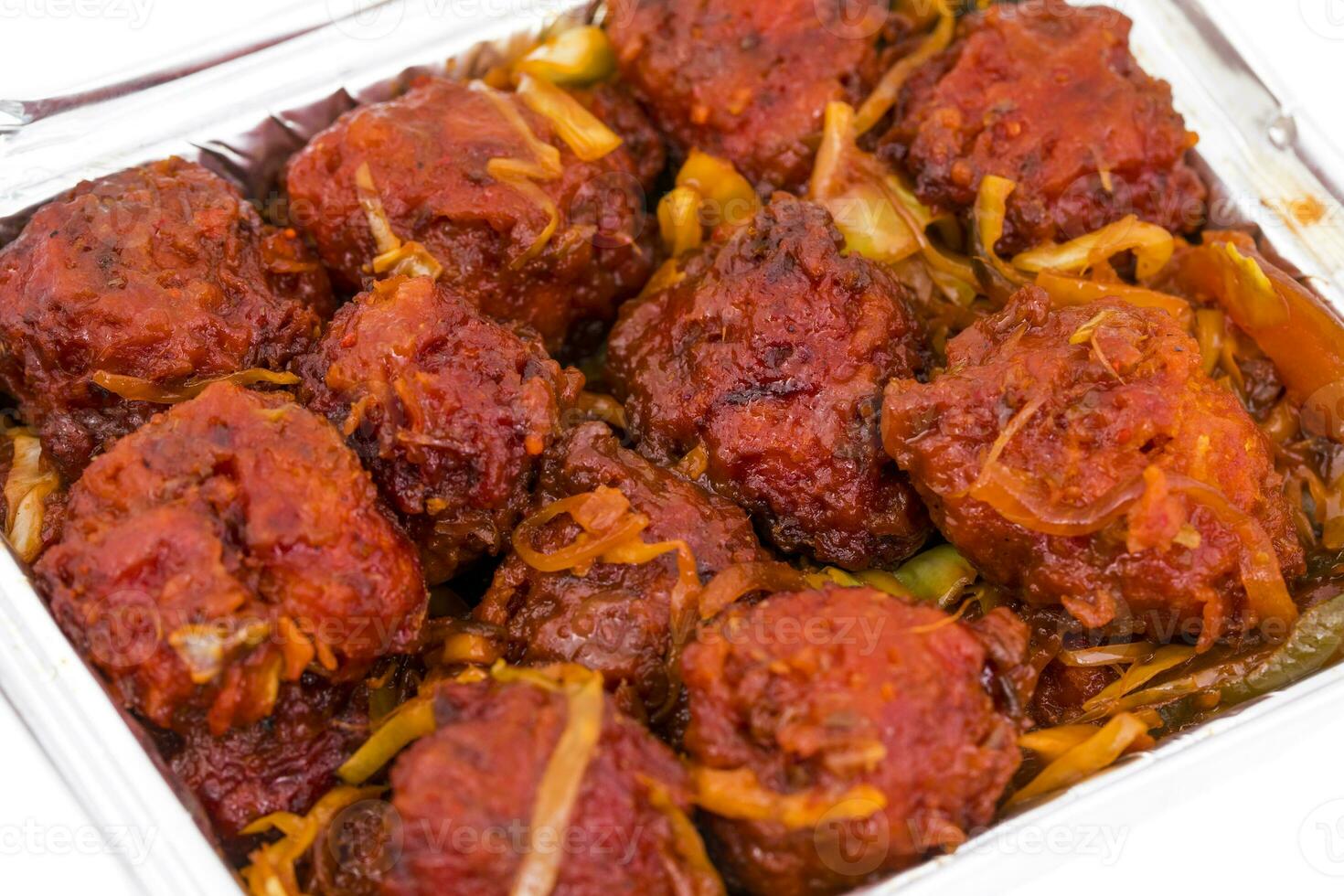 Indian Cuisine Vegetable Manchurian on White Background photo