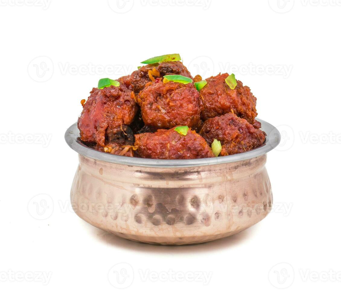Indian Cuisine Vegetable Manchurian on White Background photo