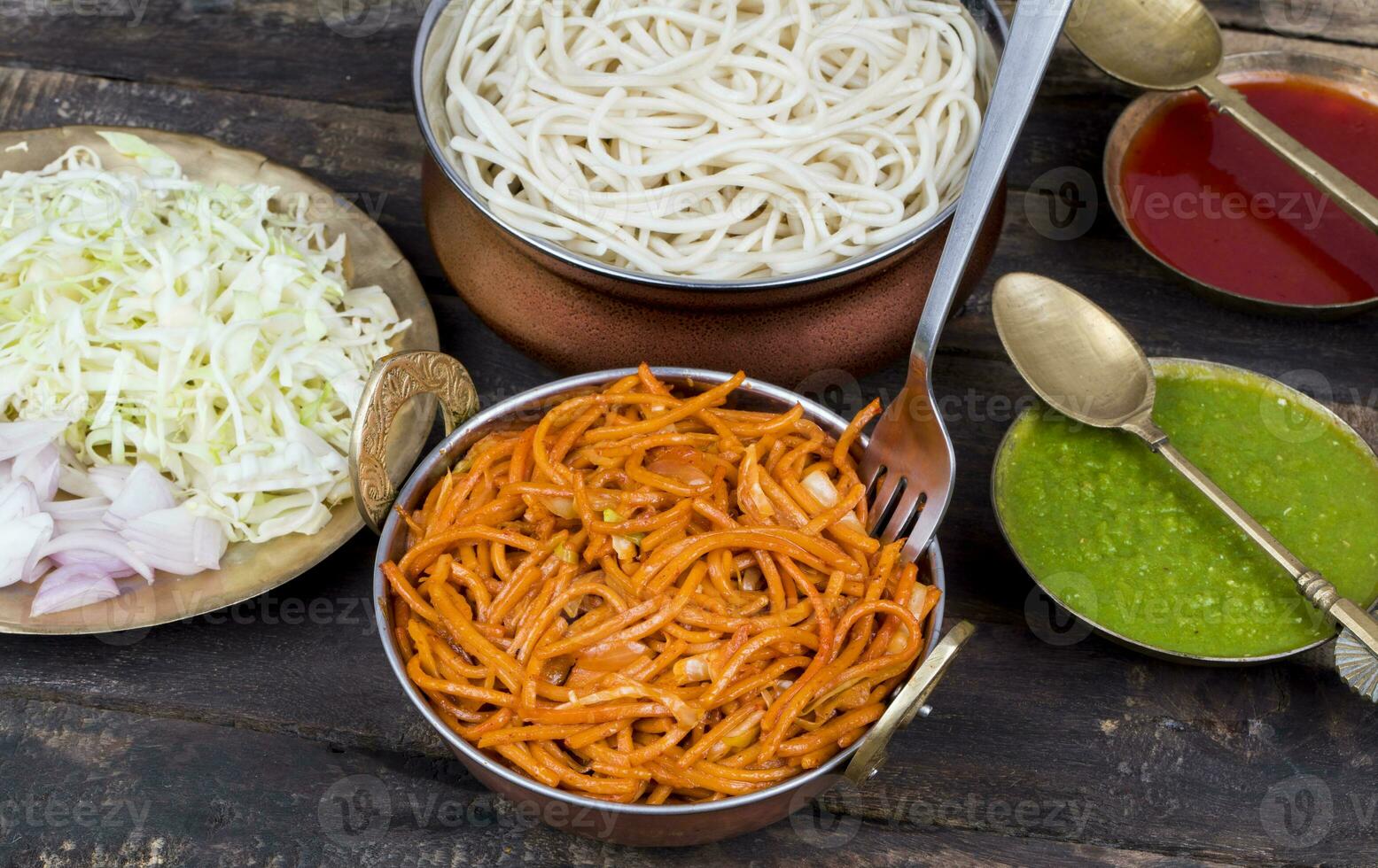 Spicy Fried Vegetable Veg Chow Mein on Wooden Table photo