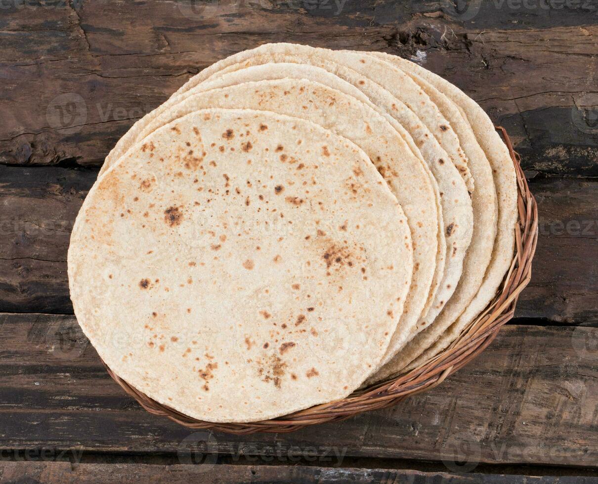 Indian Traditional Cuisine Chapati on Wooden Background photo