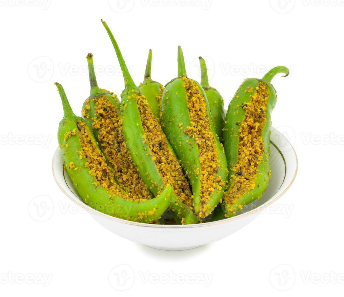 Indian Spicy Green Chilli Pickle on White Background photo