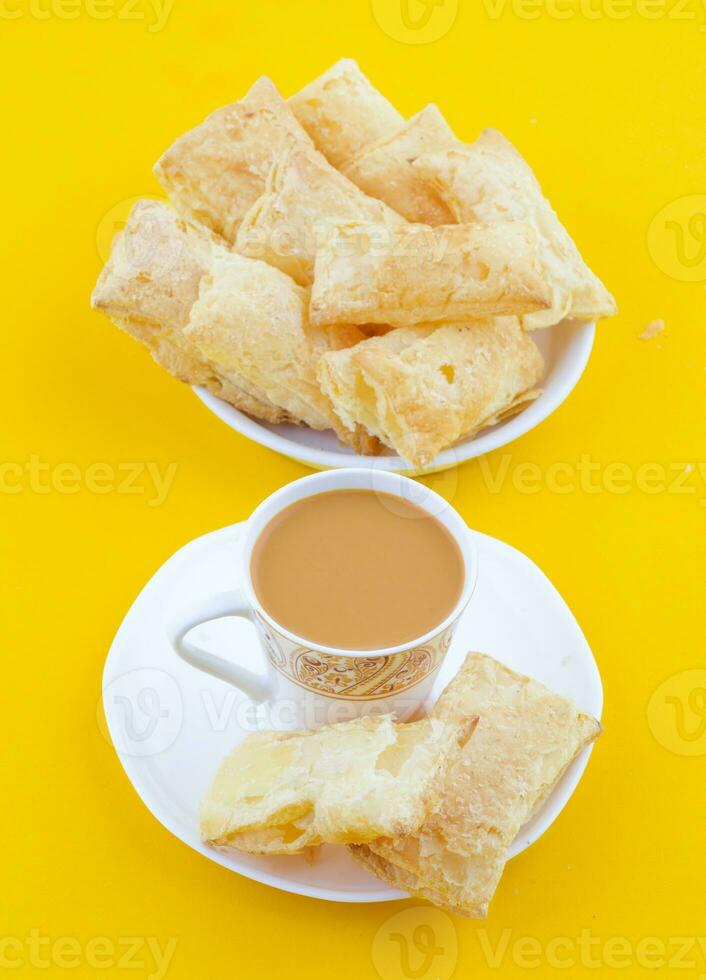 Indian Tea Time Breakfast Khari on Yellow Background photo