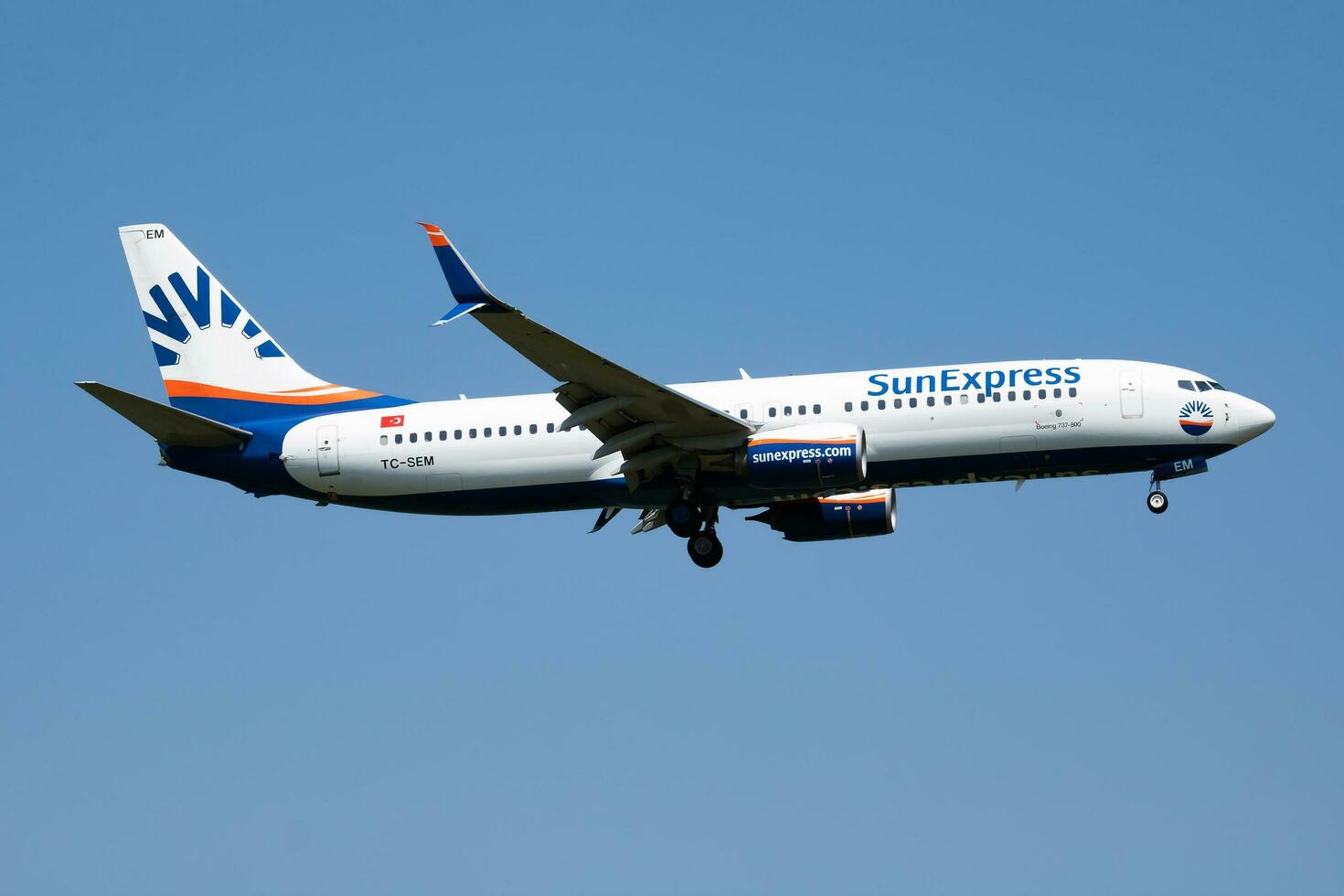 Sunexpress Boeing 737-800 TC-SEM passenger plane arrival and landing at Vienna Airport photo