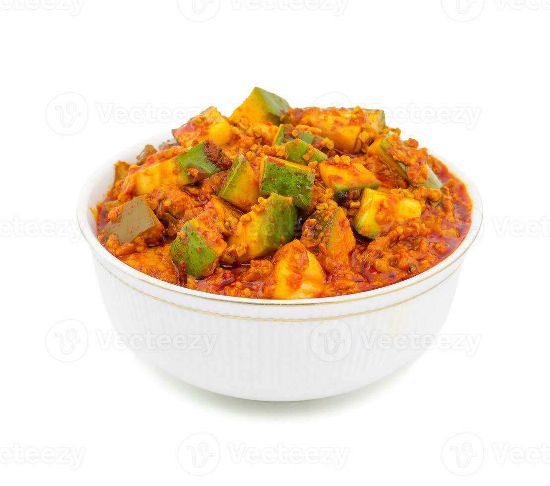 Indian Traditional Raw Mango Pickle on White Background photo