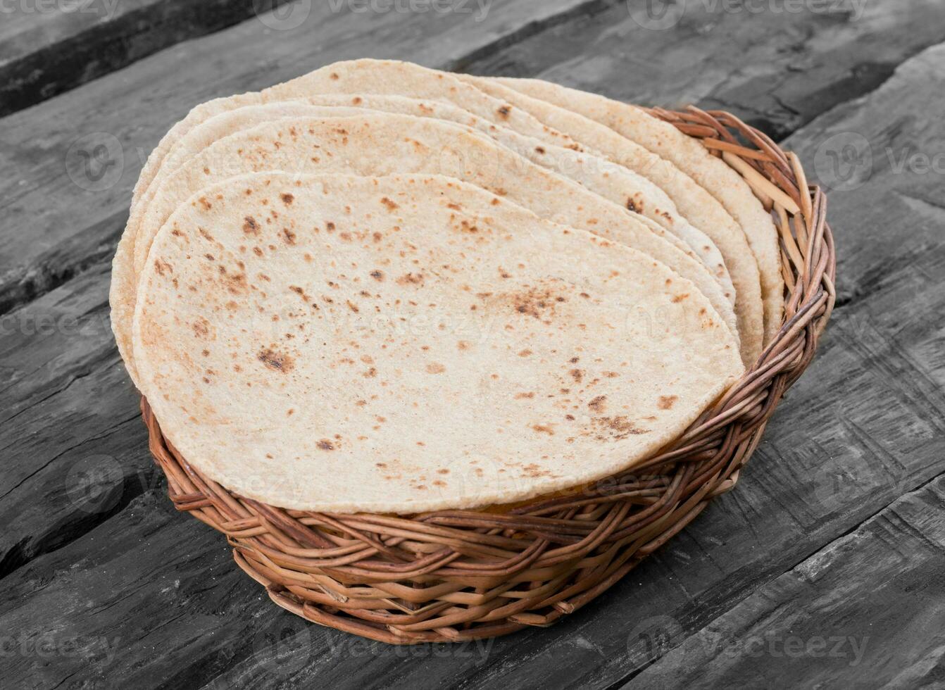 Indian Traditional Cuisine Chapati on Wooden Background photo