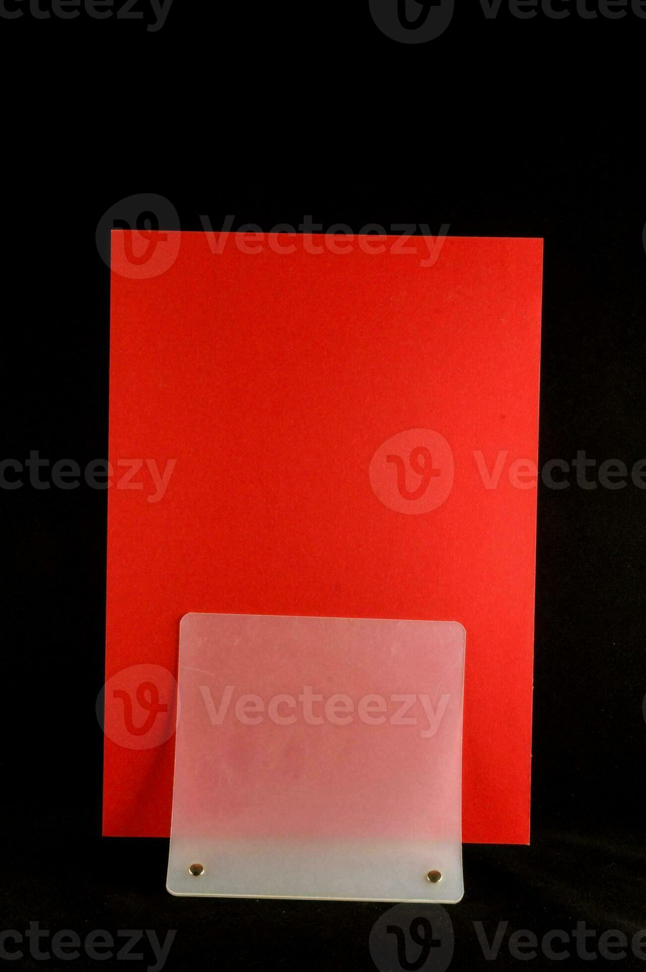 a red square with a white card on top 35252155 Stock Photo at Vecteezy