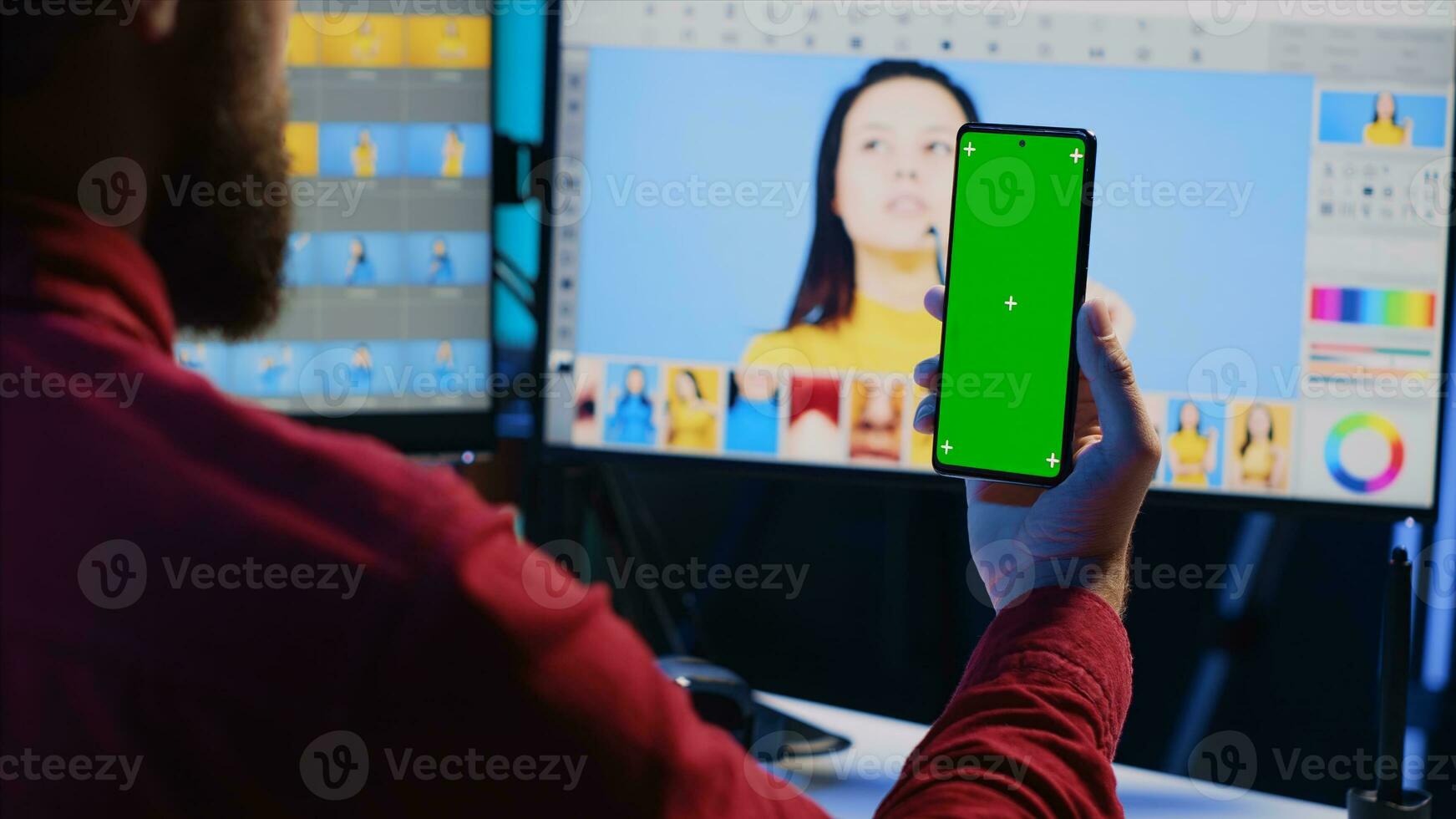 Photographer following online tutorial on mockup phone about using photo editing software to improve images quality. Photo editor learning from online guide on green screen smartphone