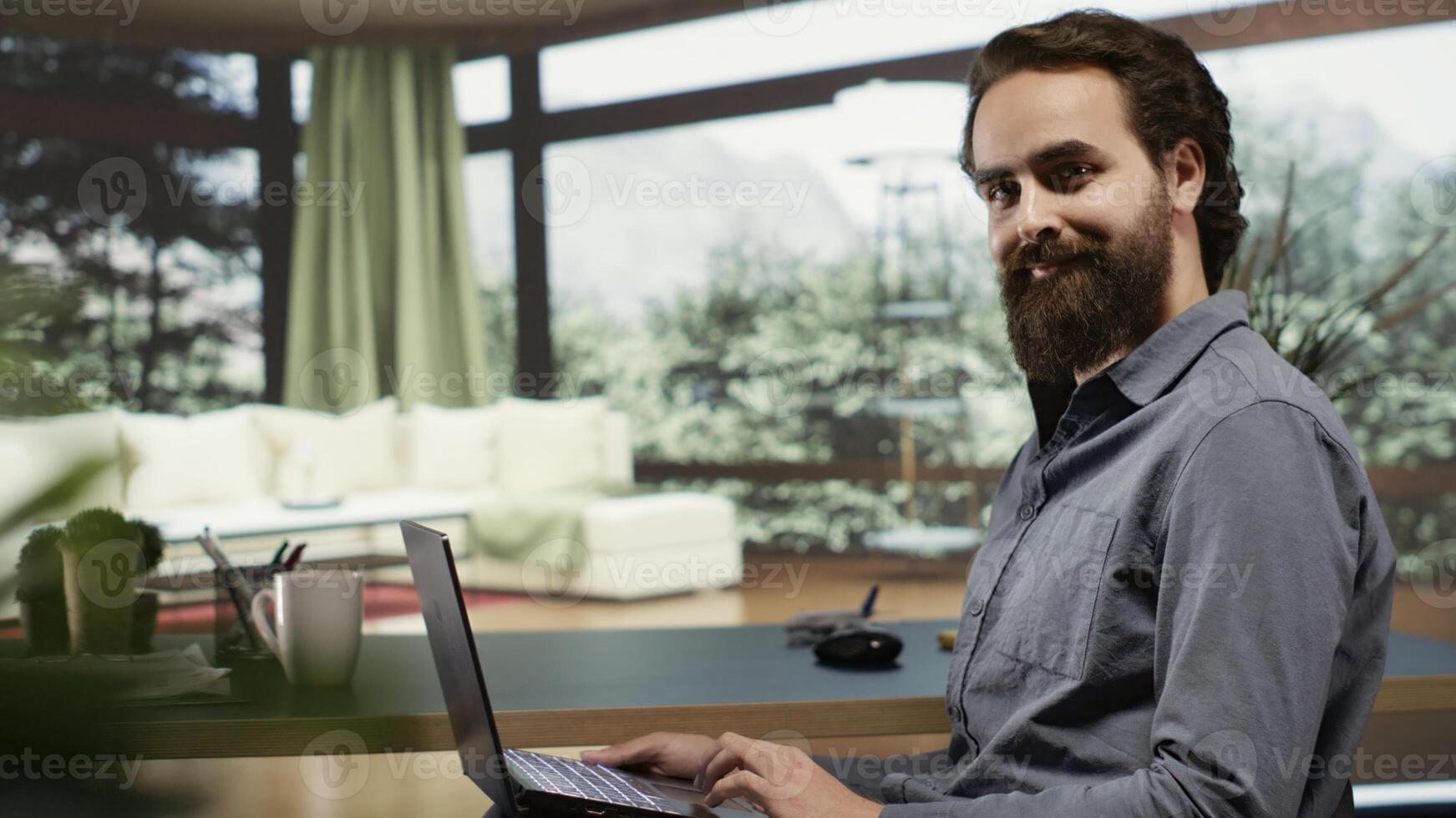 Rich adult seated at desk in his expensive lodge with massive windows displaying breathtaking forest scenery, occupied with contemplating about additional income. Investor in mountaintop villa. photo