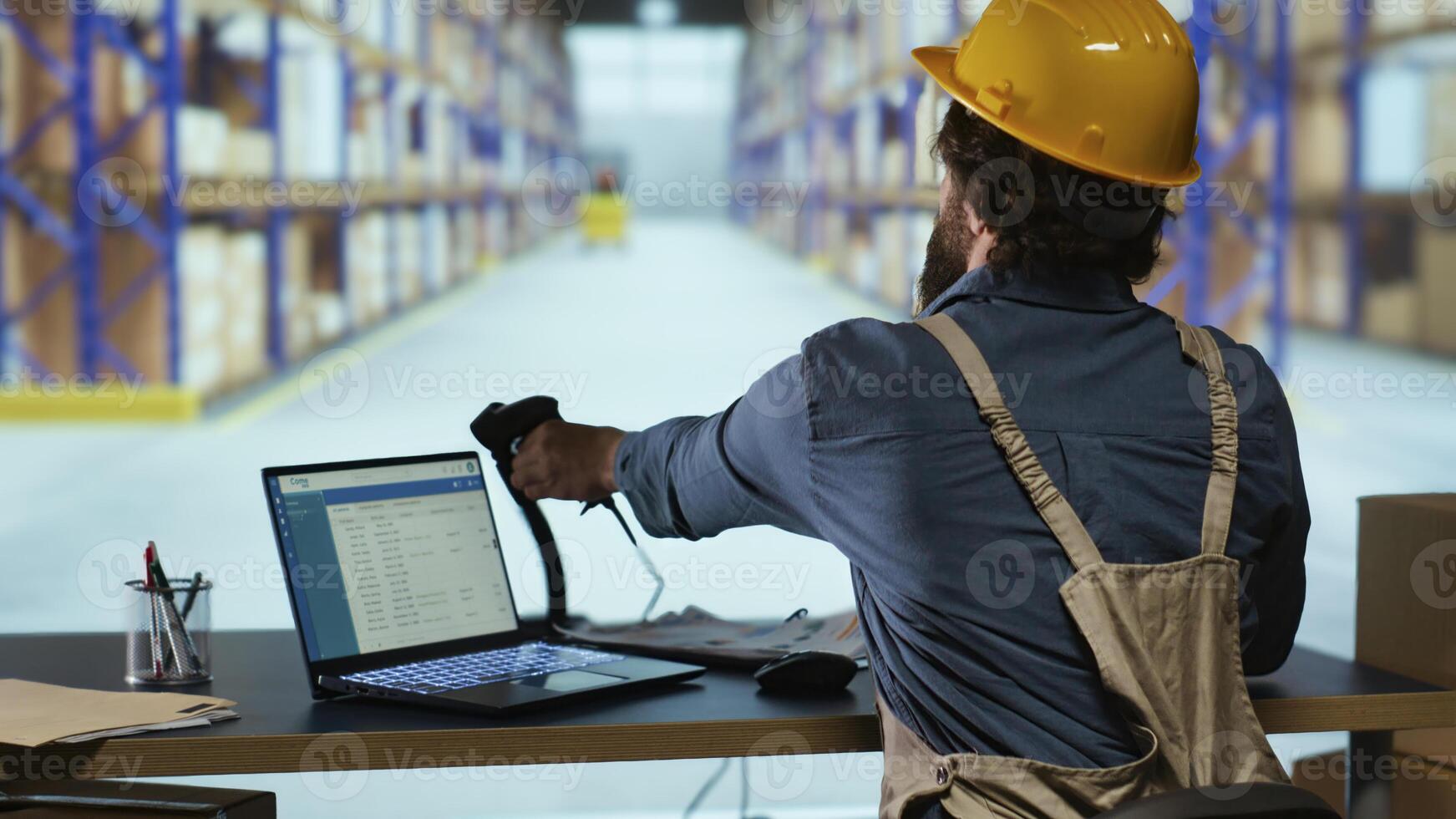 Distribution operations manager works with barcode reader to ensure good quality merchandise inside parcel, industrial shipment. Employee scanning cargo labels at import export storehouse. photo