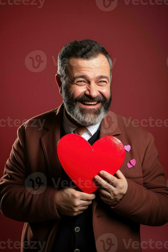 AI generated Portrait of a happy man with a red heart on Valentine's day concept. photo