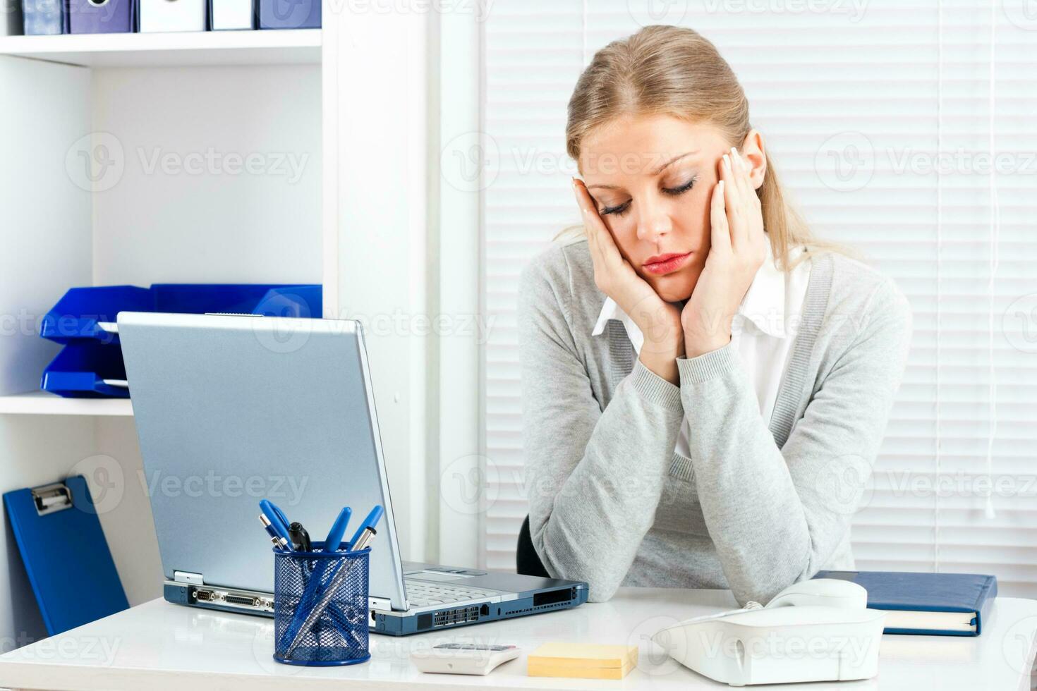 Image of tired businesswoman photo