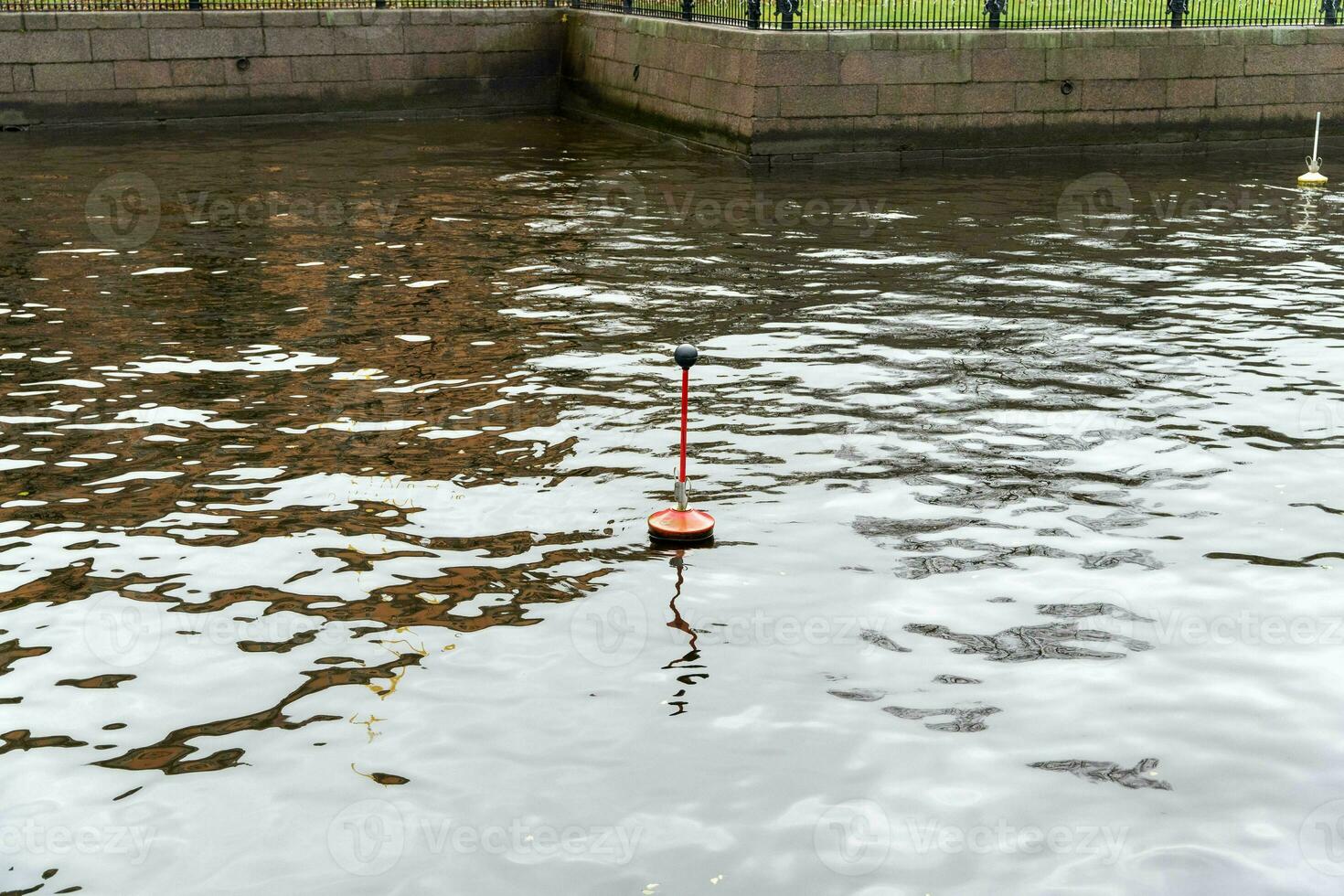 Nautical Hanger Sign on Urban River Channel for Navigational Guidance photo