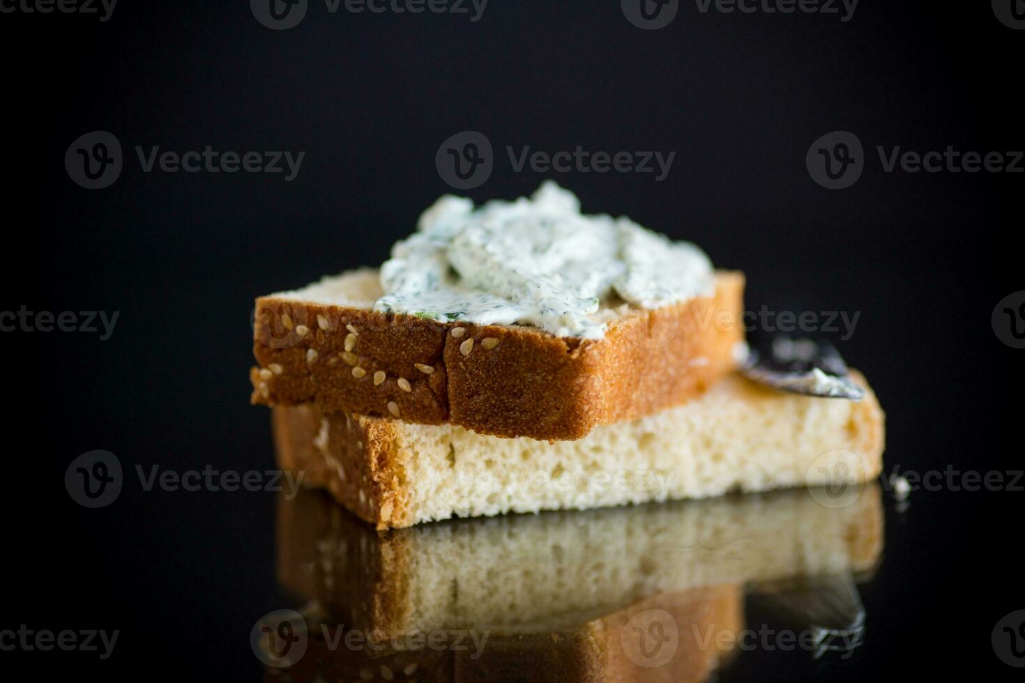 homemade salted curd spread with herbs and garlic photo