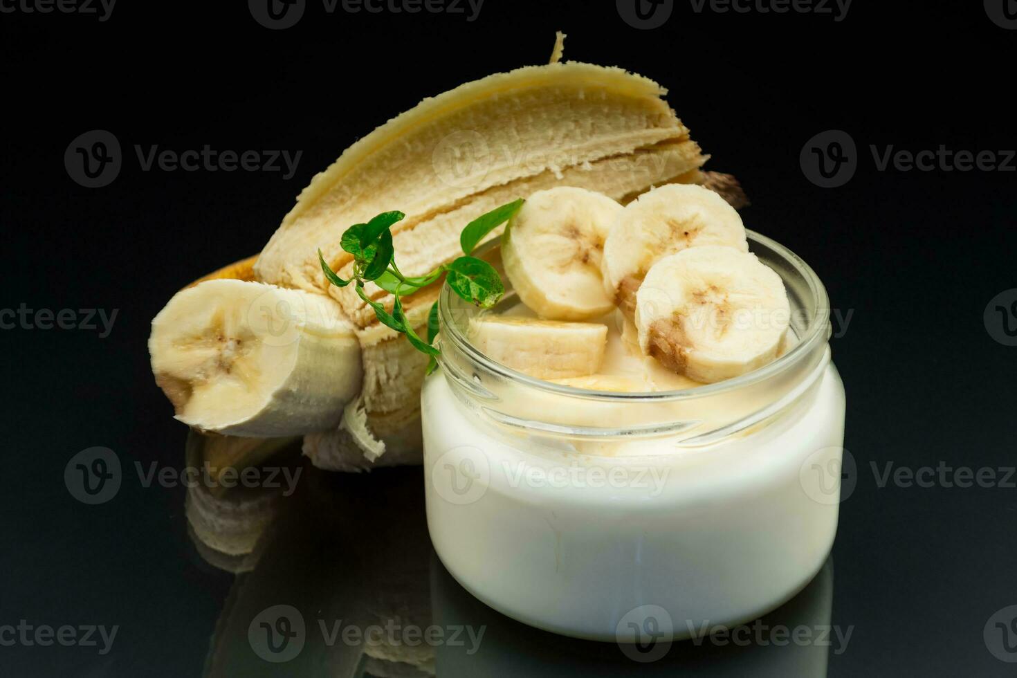 home sweet banana yogurt in a glass jar photo