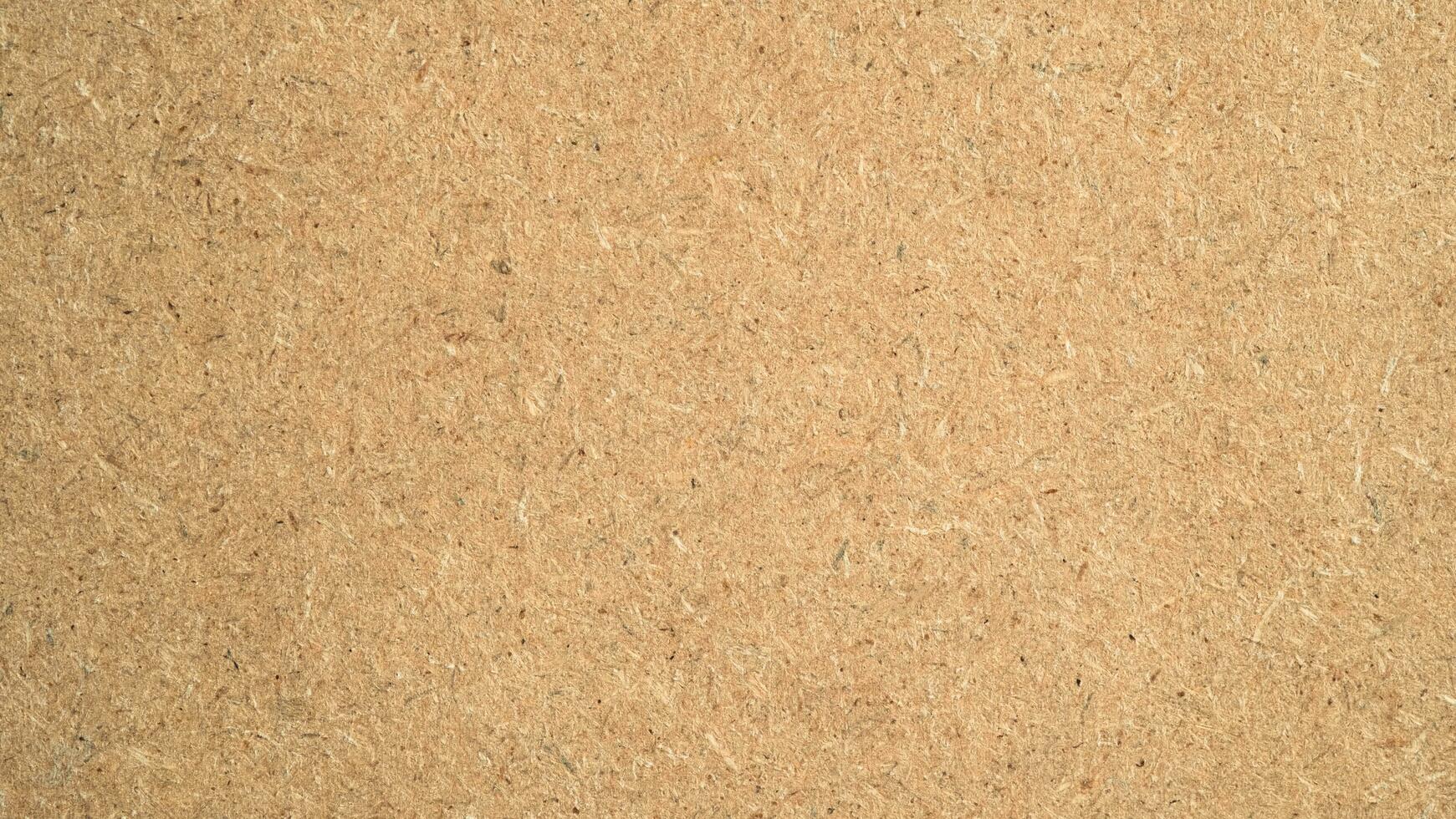Empty blank Brown yellow cork board or note board. Close-up of corkboard texture photo