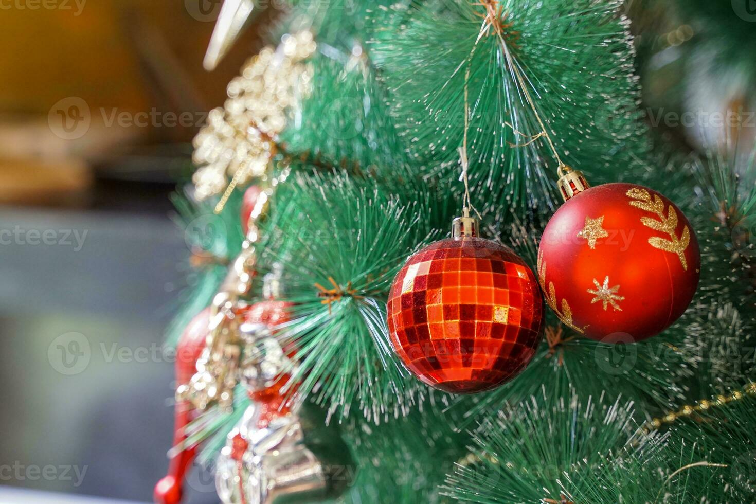red decorated balls for decoration on the Christmas tree to prepare for the celebration of the Christmas season every year. soft and selective focus. photo