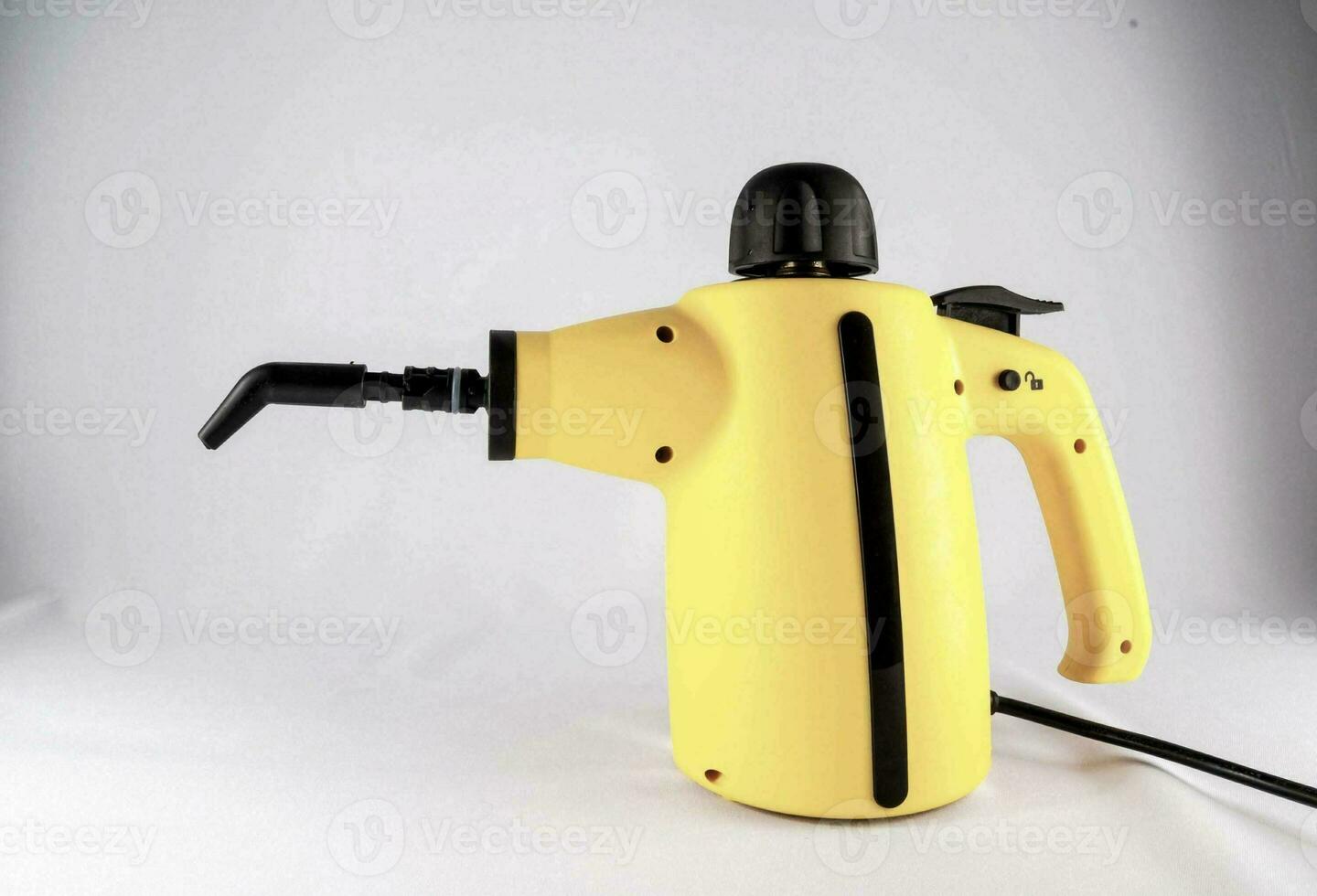 Yellow Hot Vapor Cleaning Machine isolated on white background photo