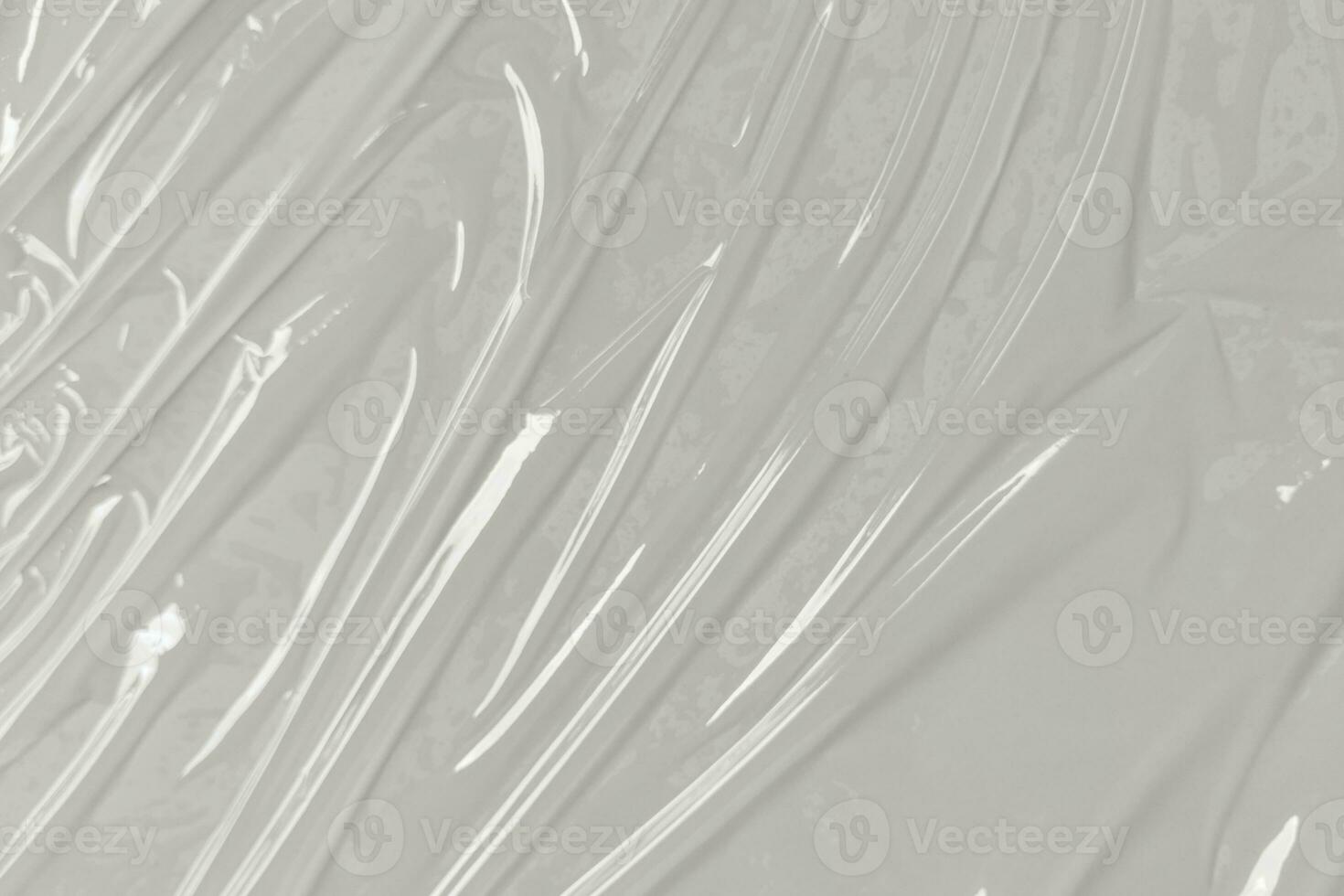 Plastic transparent cellophane bag on white background. White plastic film wrap texture background. White Plastic Bag Texture photo