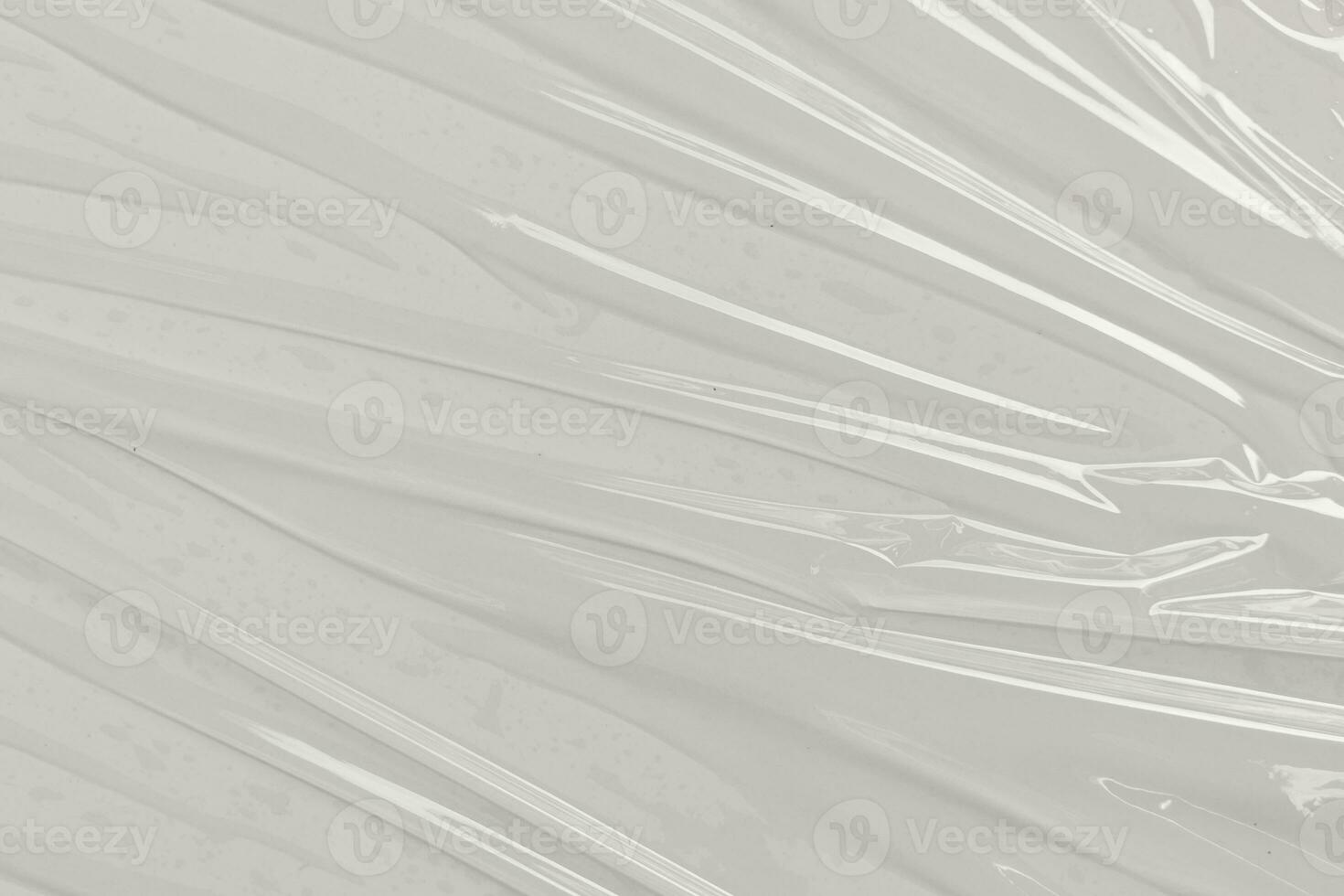 Plastic transparent cellophane bag on white background. White plastic film wrap texture background. White Plastic Bag Texture photo