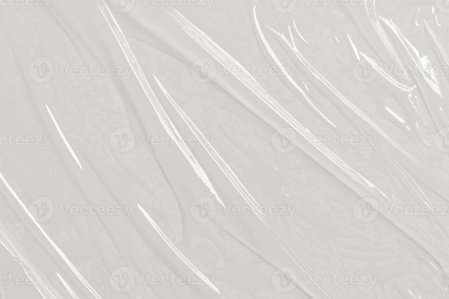 Plastic transparent cellophane bag on white background. White plastic film wrap texture background. White Plastic Bag Texture photo