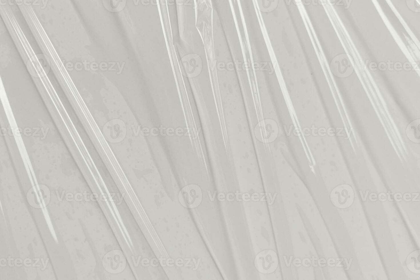 Plastic transparent cellophane bag on white background. White plastic film wrap texture background. White Plastic Bag Texture photo