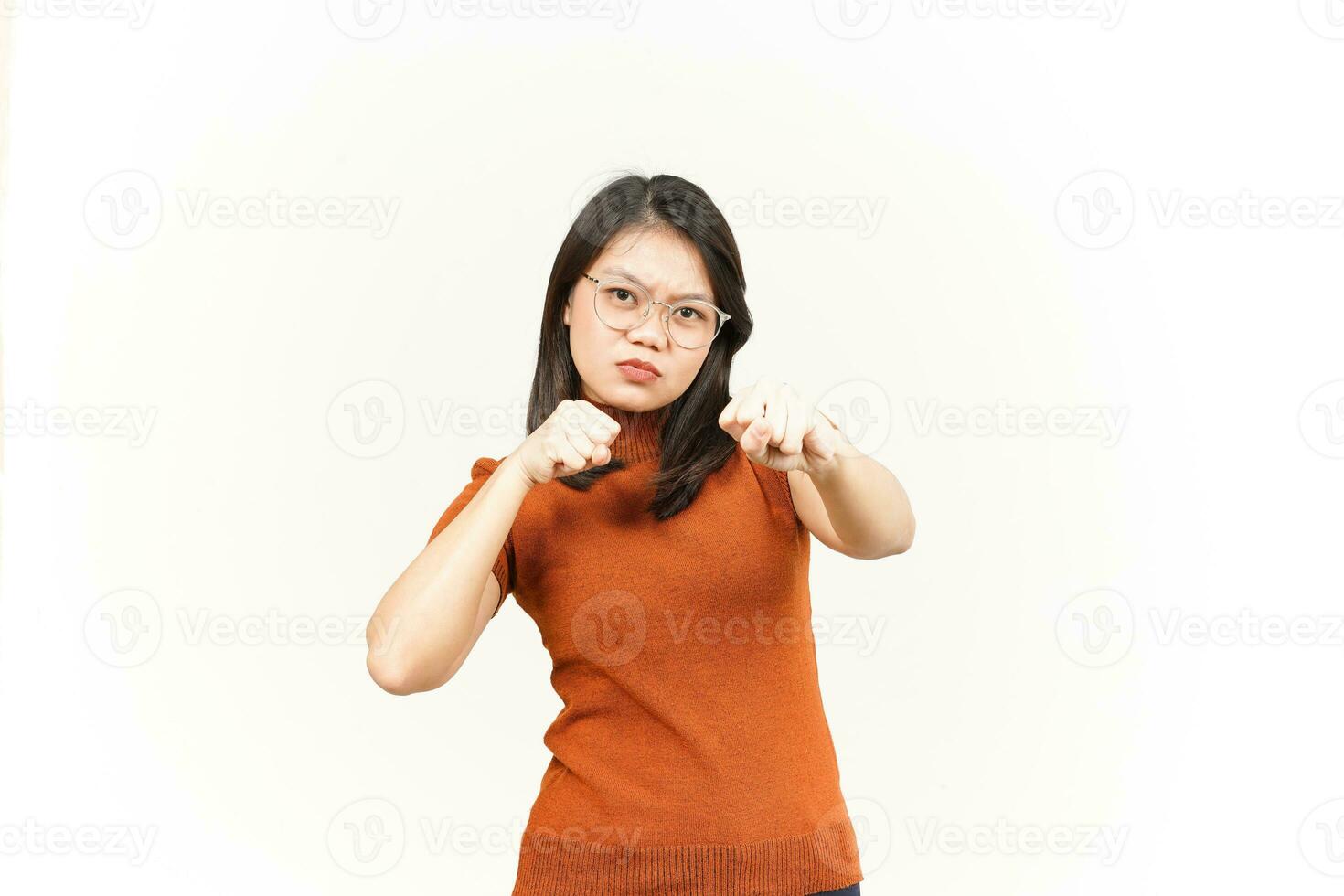 Punching fist to fight Of Beautiful Asian Woman Isolated On White Background photo