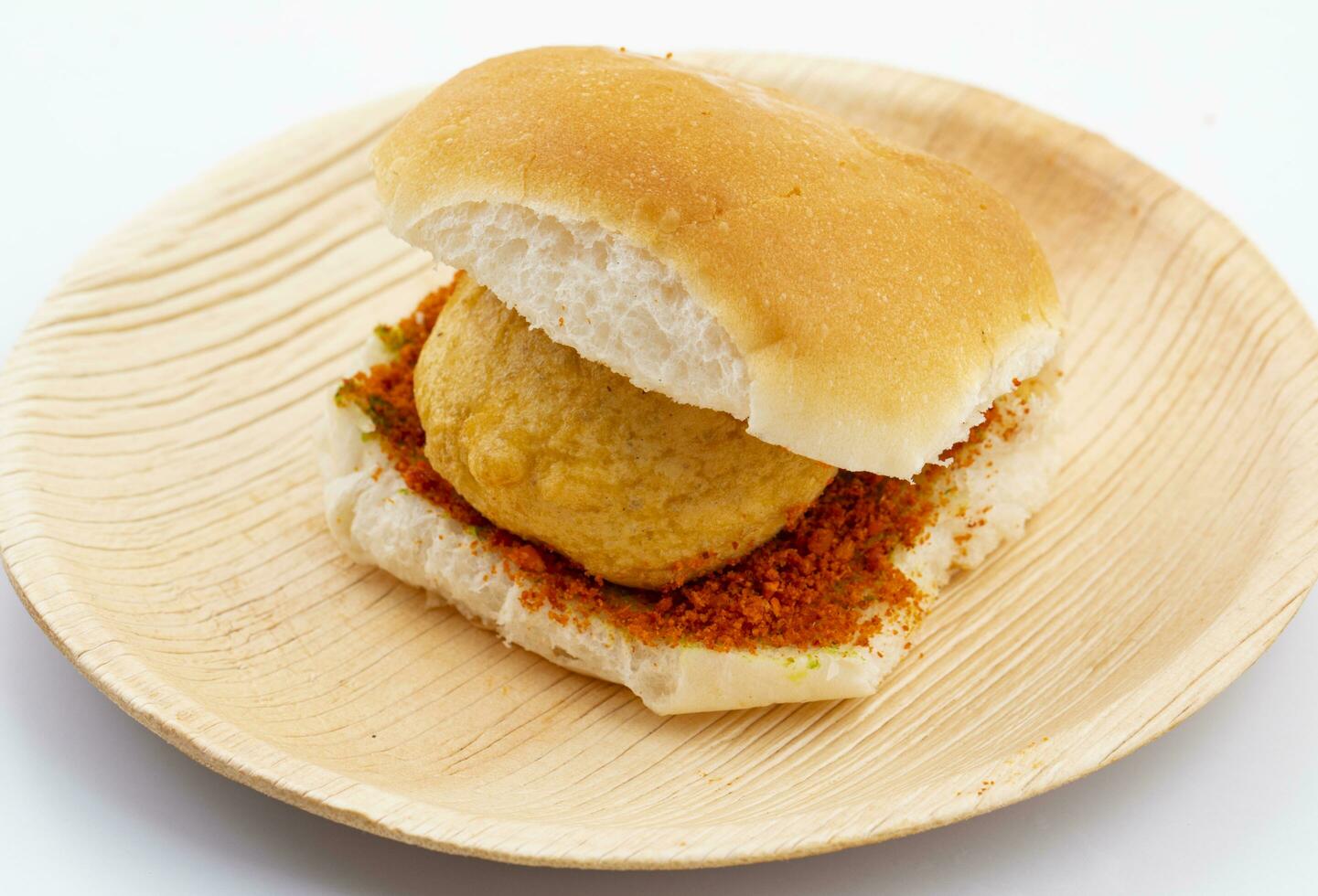 Indian Famous Street Food Vada Pav is a Vegetarian Fast Food Dish From Maharashtra photo