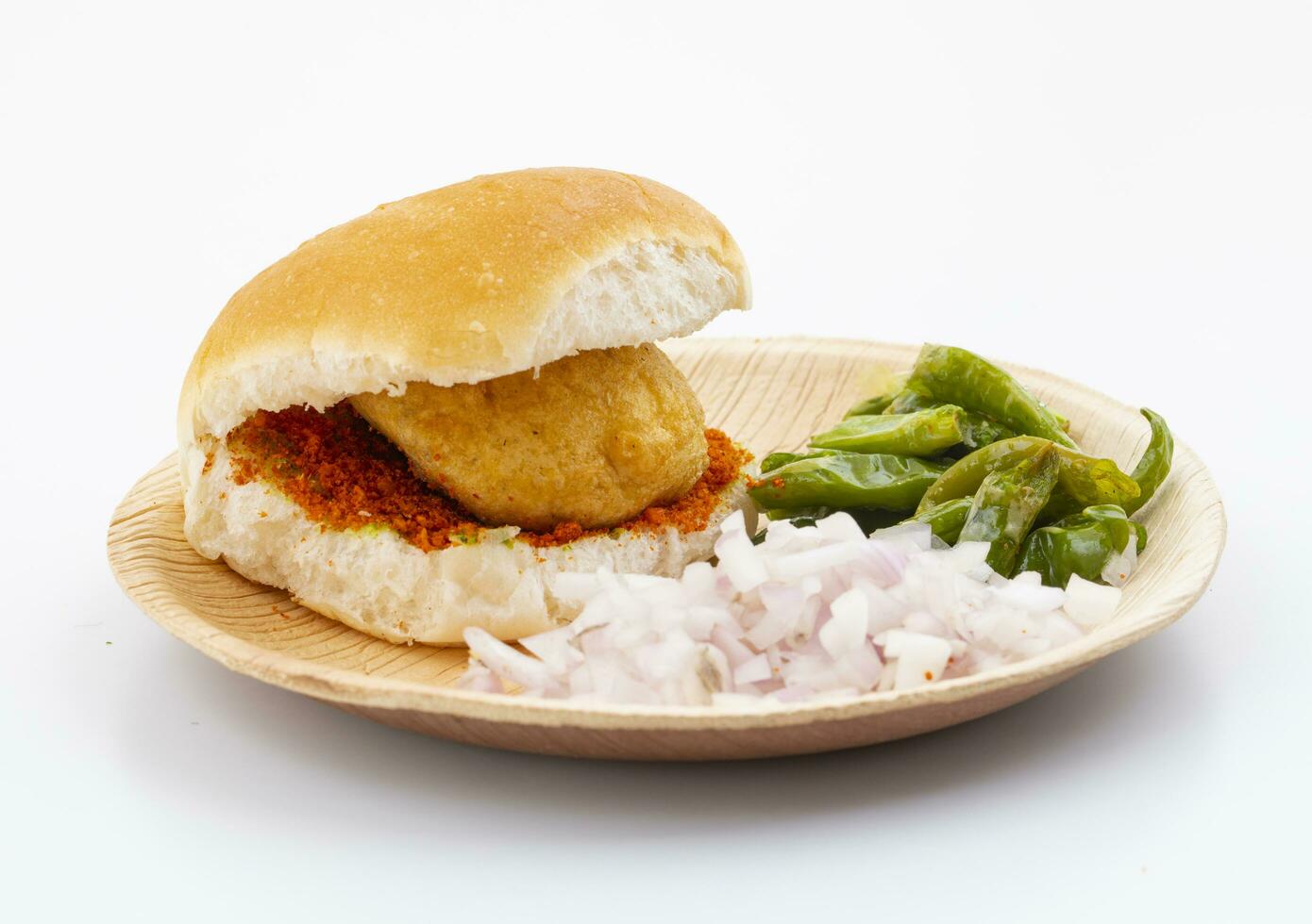 Indian Famous Street Food Vada Pav is a Vegetarian Fast Food Dish From Maharashtra photo