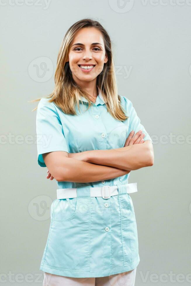 Portrait of beautiful nurse looking at camera. photo