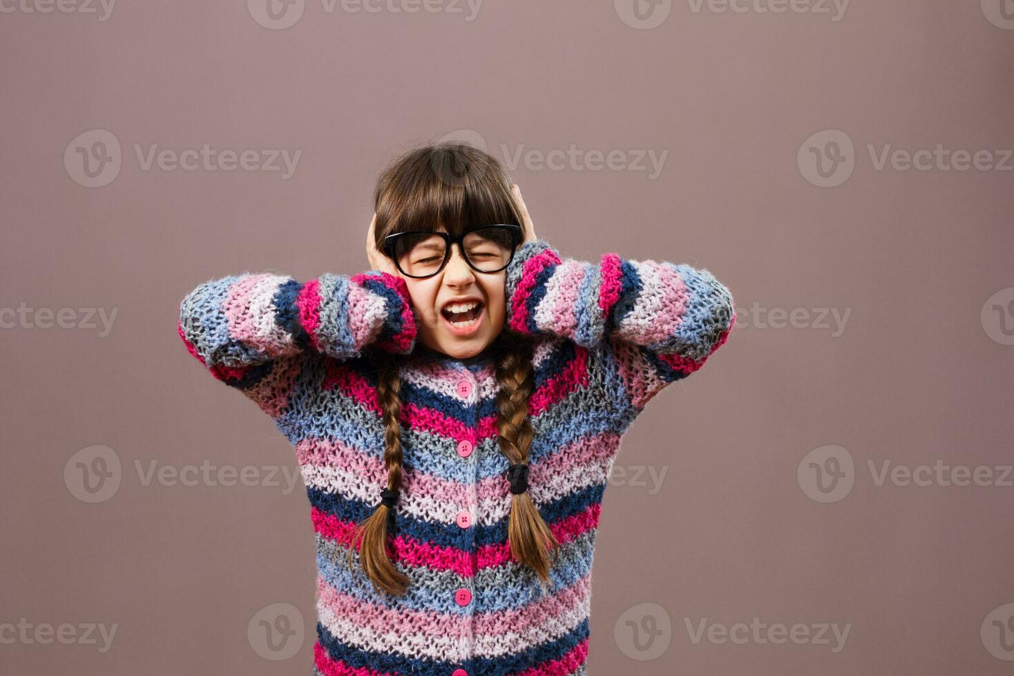 Furious little nerdy girl doesn't want to listen photo