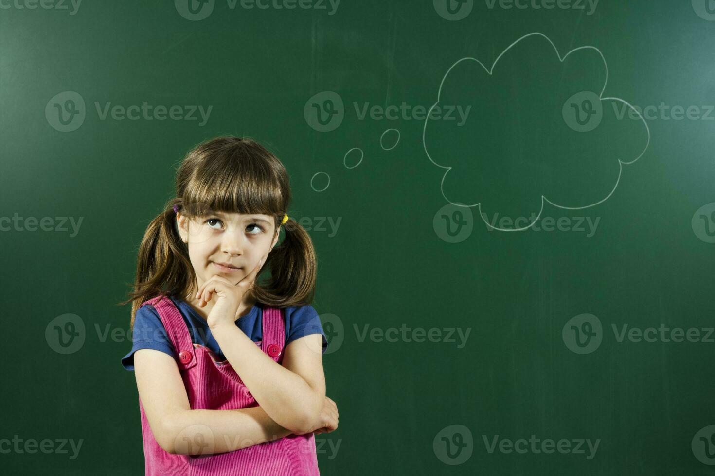 Little girl thinking photo
