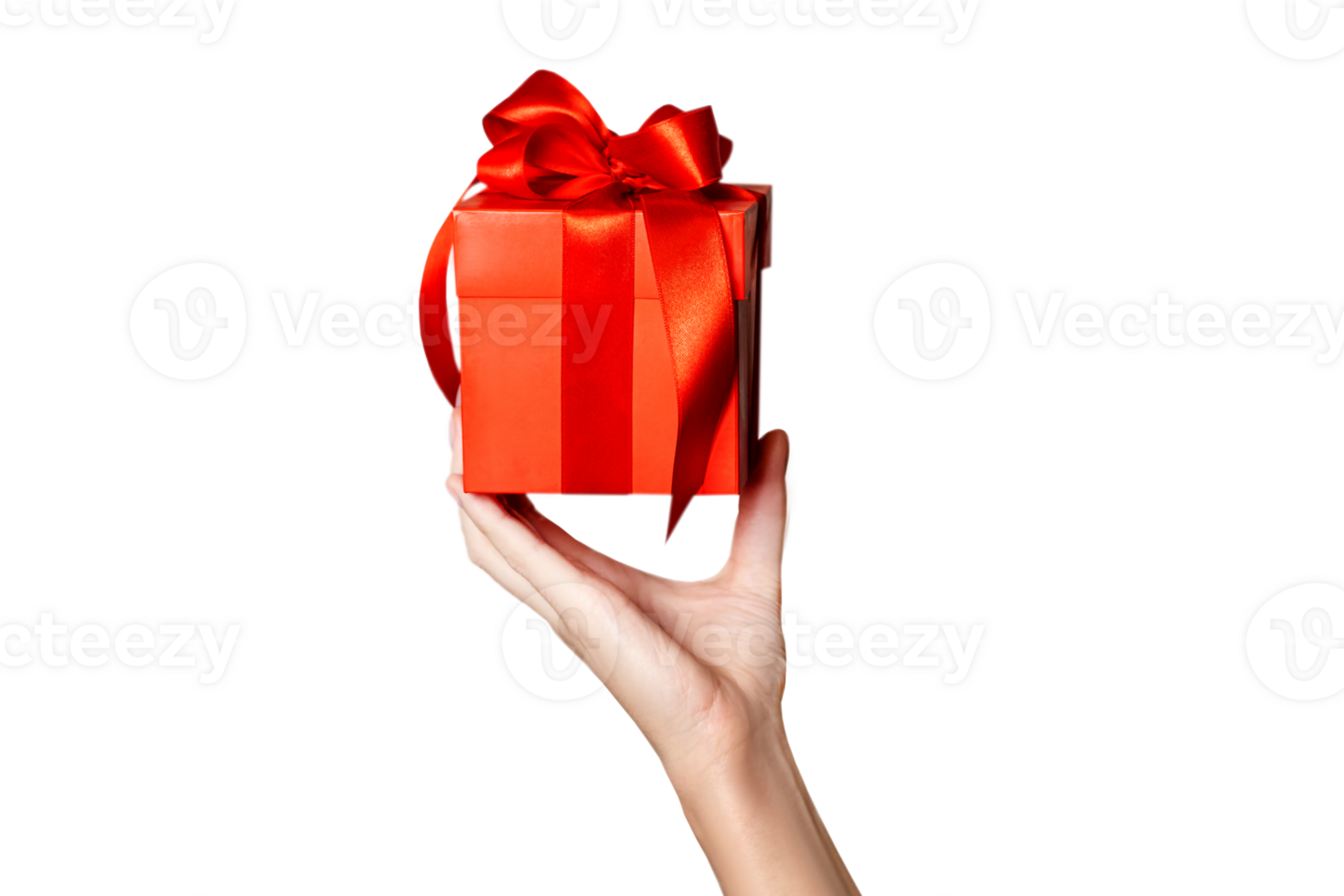 The theme of celebrations and gifts hand holding a gift wrapped in red box with red bow isolated on png transparent background