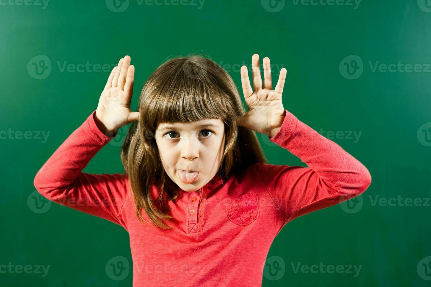 Child sticking out Tongue photo