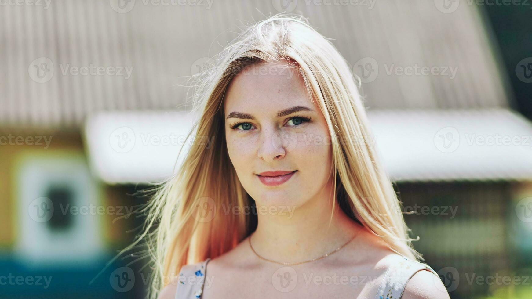 Portrait of a blonde girl of Slavic appearance. Closeup face. photo