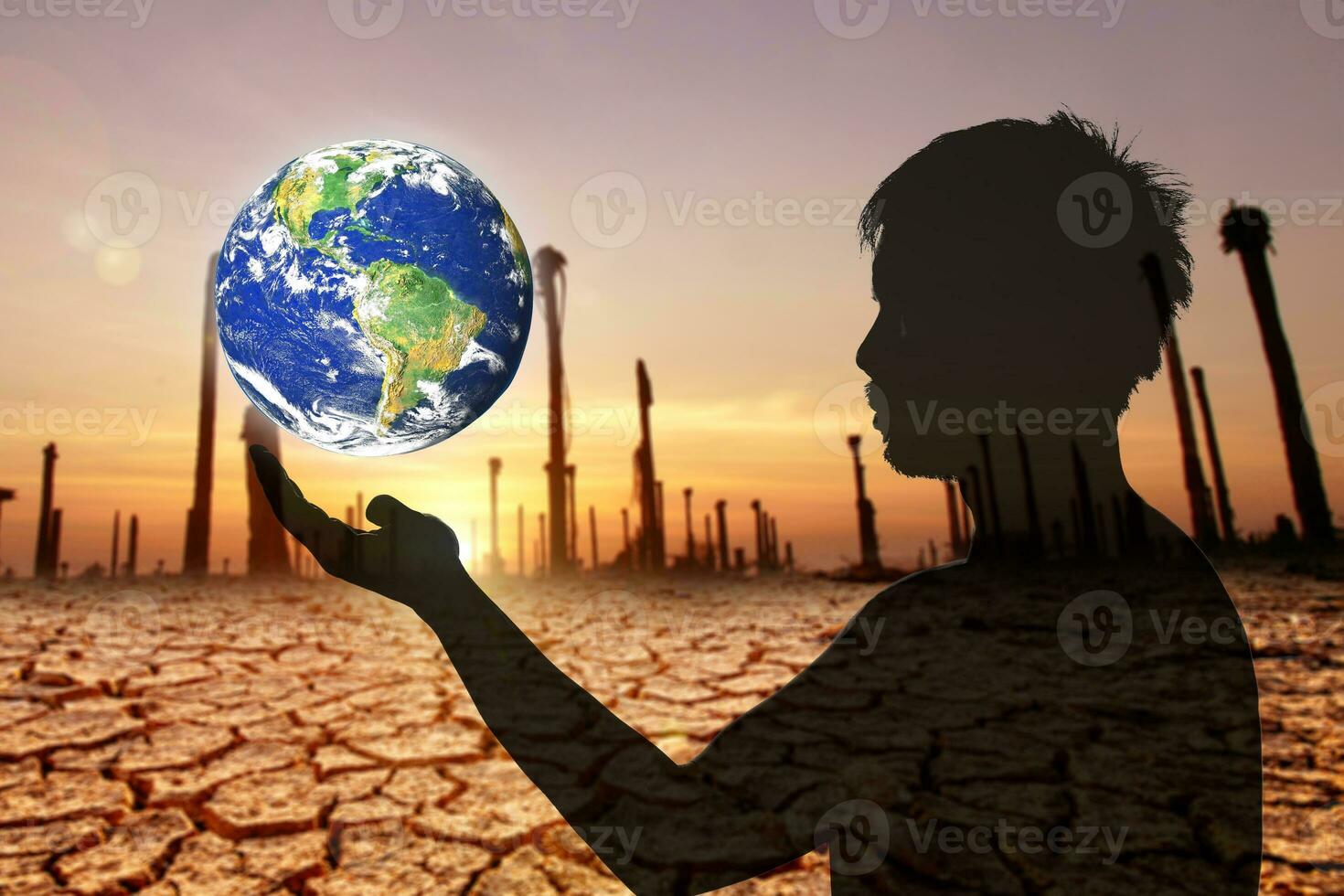 Love the earth and protect the environment concept. Earth day. Earth in people's hands. photo