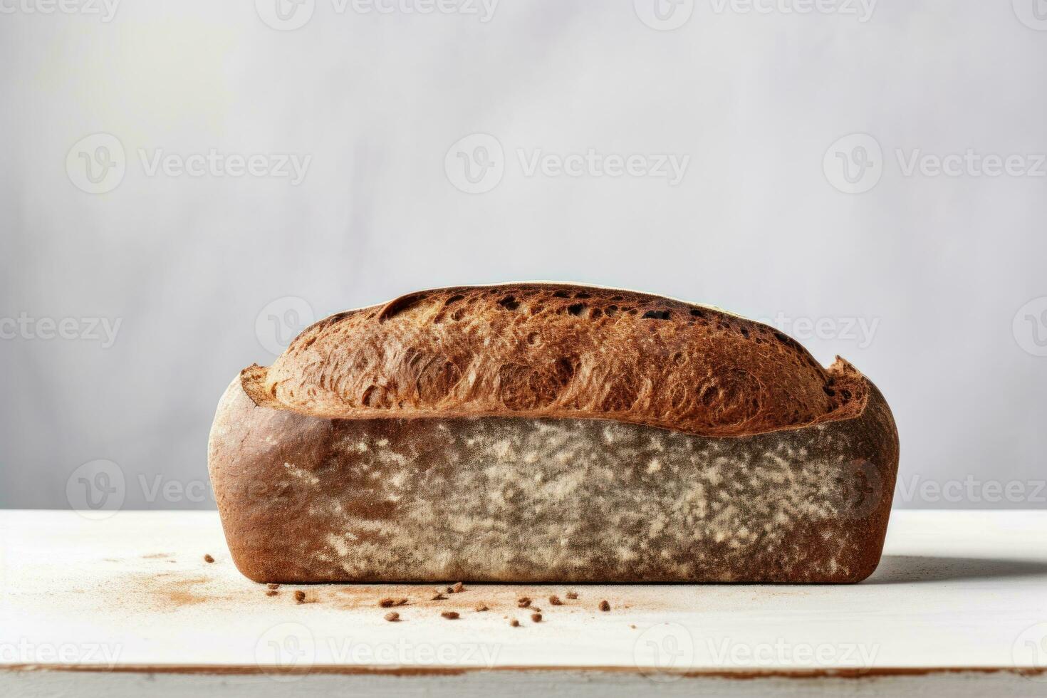AI generated Rye Bread on white background. Freshly baked golden brown loaf of bread with crispy crust. Made from organic whole grain rye flour. Healthy food. For bakery, food blog, recipe book photo
