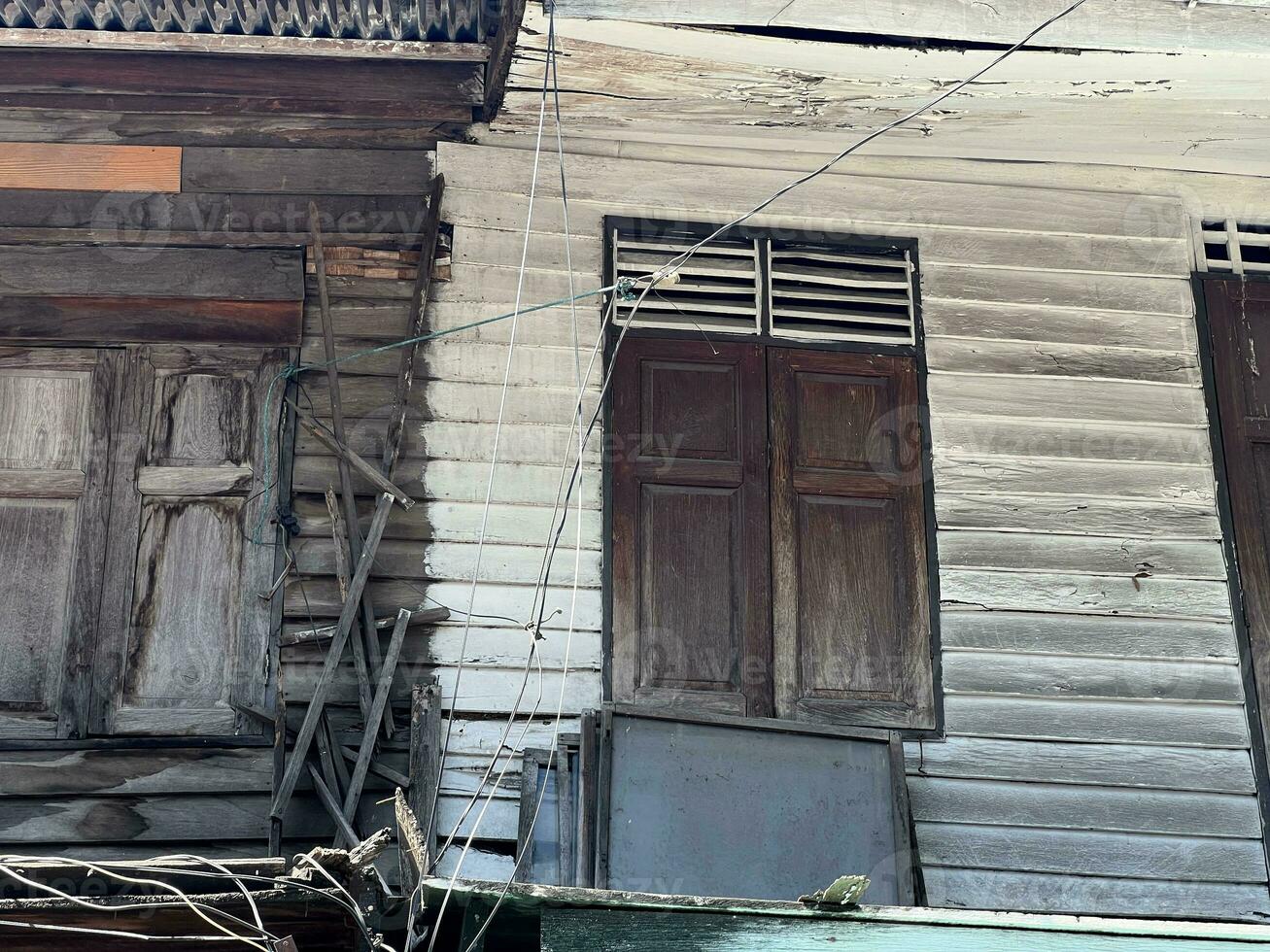 old house with window in Thailand photo